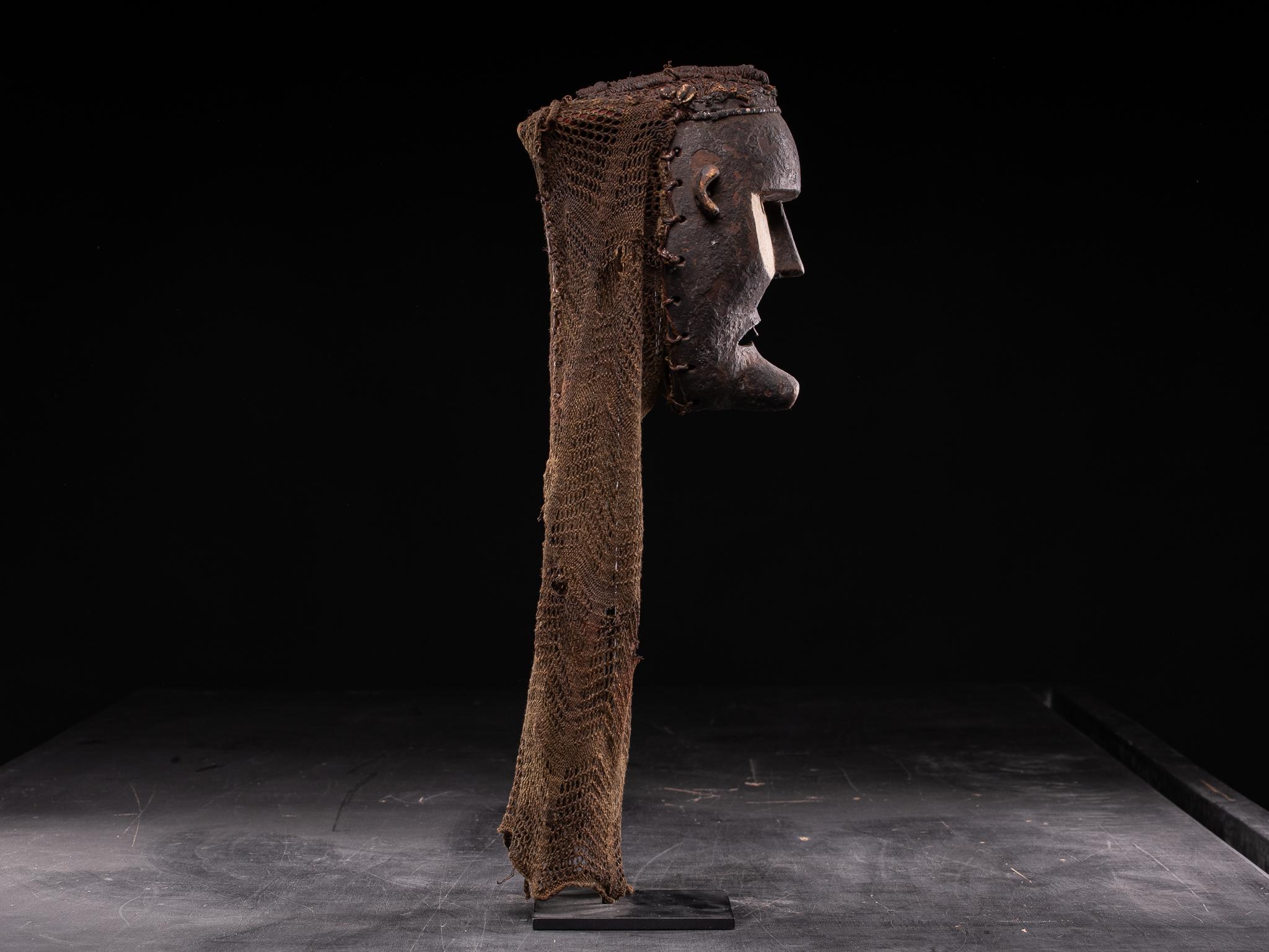 Wood Ethnodesign Katoyo Mask representing the 