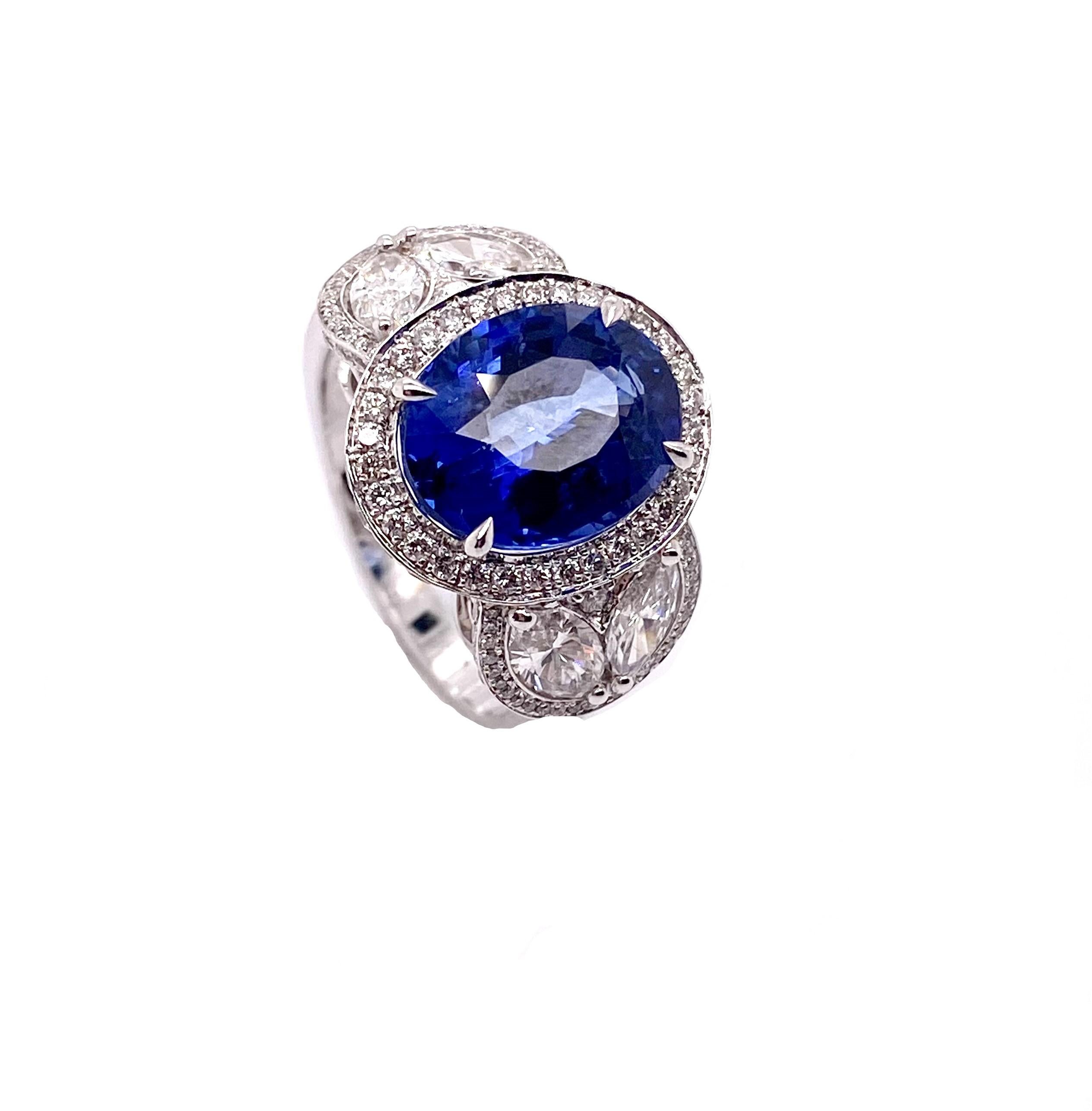 Oval Cut Ethonica Blue Sapphire and Diamond Ring in 18 Karat Gold