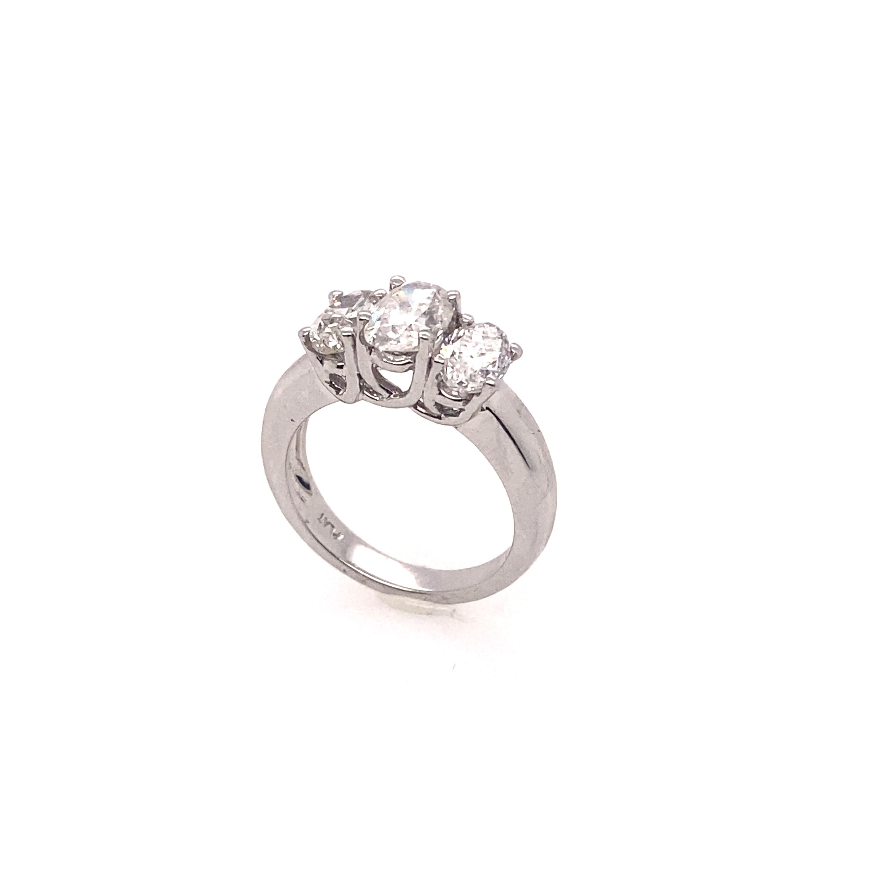 The three oval diamonds are set in the platinum ring. The center oval diamond is EGL certified as a weight of 1.10 carat, F I1 clarity. The ring band is thick and it gives the powerful and elegant impressions. It is very perfect for who loves the