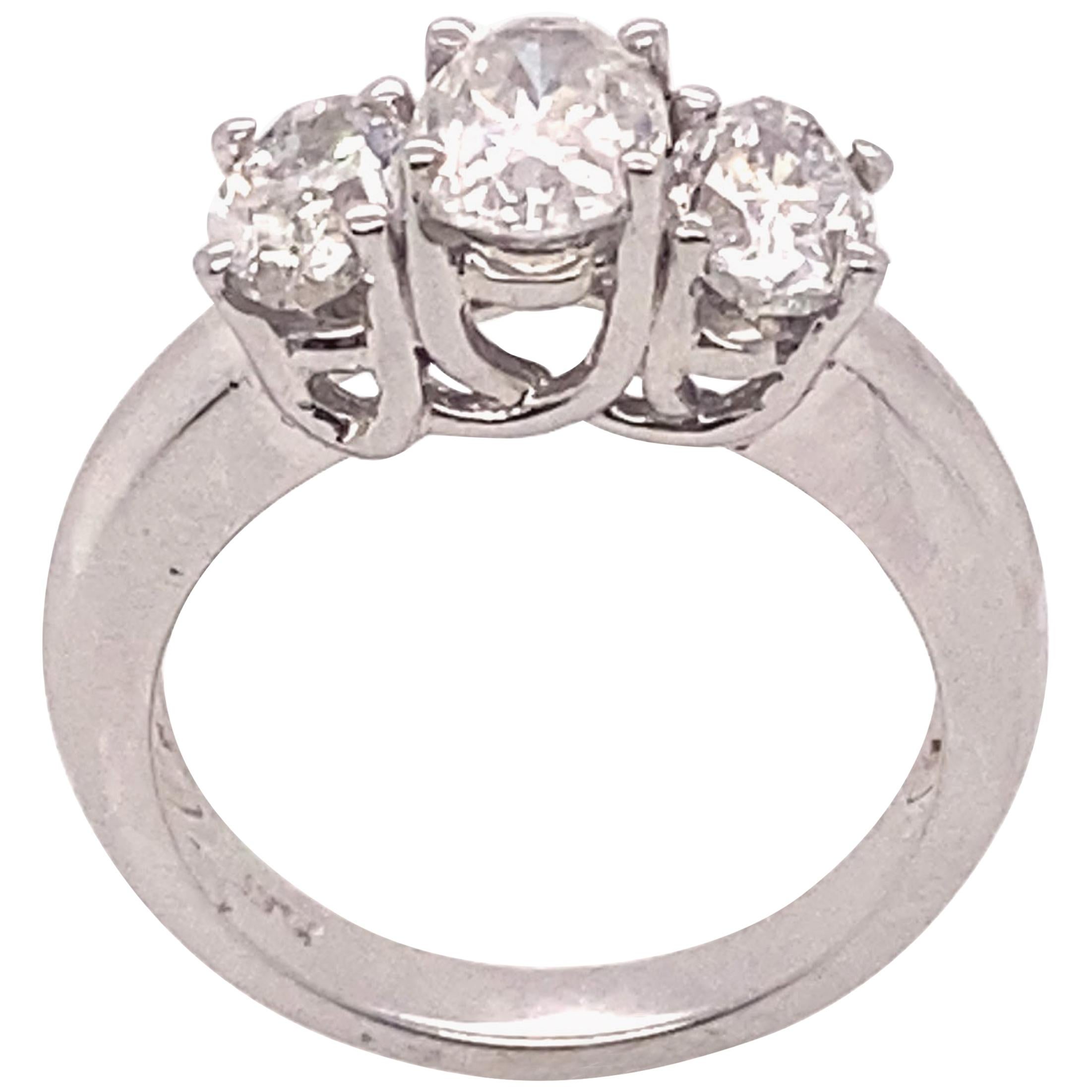 Ethonica Certified Three-Stone Diamond Ring in Platinum For Sale