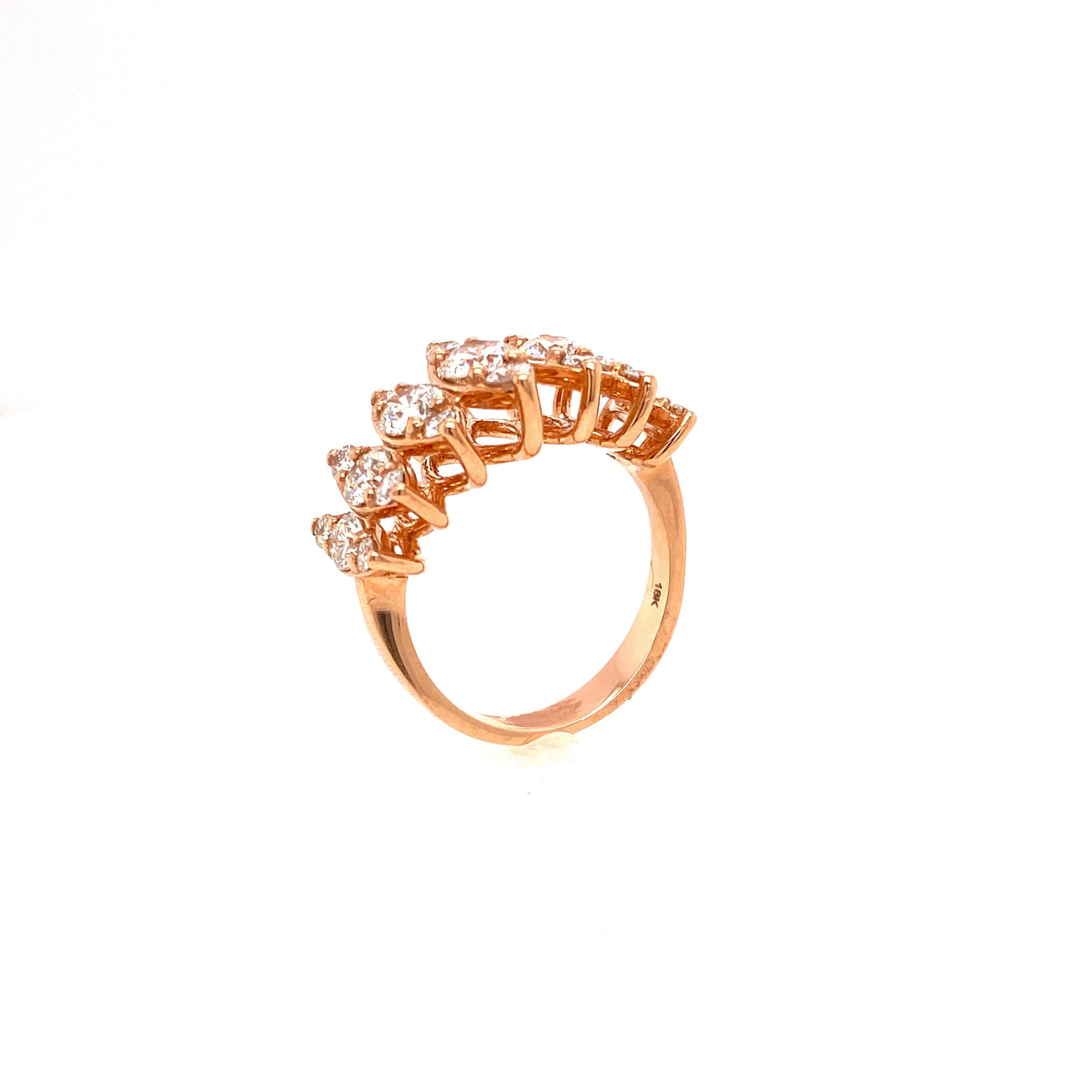 Elegant band, crafted in 18K Rose Gold. Twenty-one round brilliant cut diamonds weighing 2.09 carat mounted in marquise design with six prongs. Unique and perfect for daily wear. 

Diamond Shape: Brilliant Round
Diamond Color & Clarity: H-I,