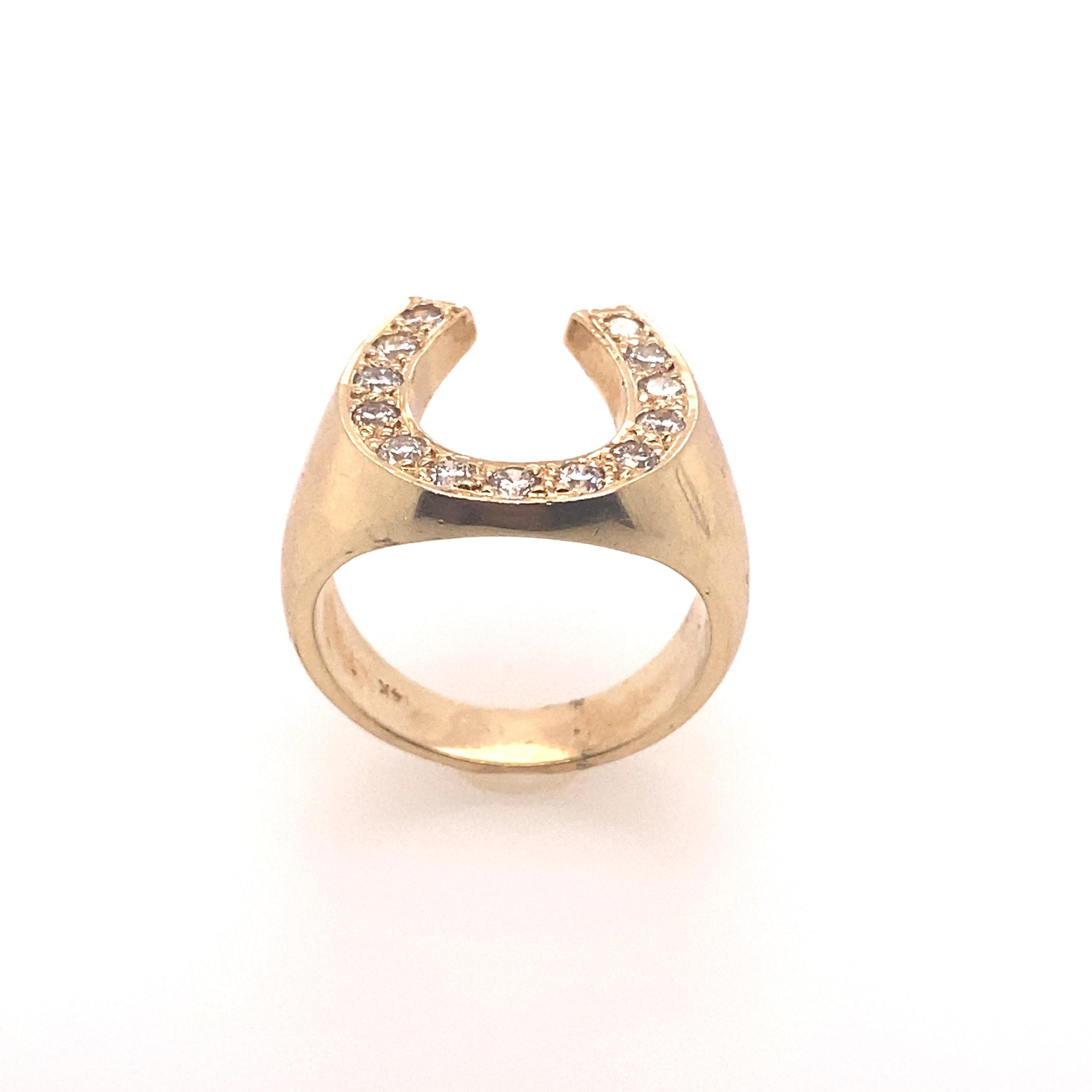 This stunning unisex Dome ring is crafted U symbol in 14 karat yellow gold.  The ring design is unique and 13 brilliant round diamonds are set in the U symbol. This ring features the bold and powerful statement. 

Diamonds Weight: 0.75