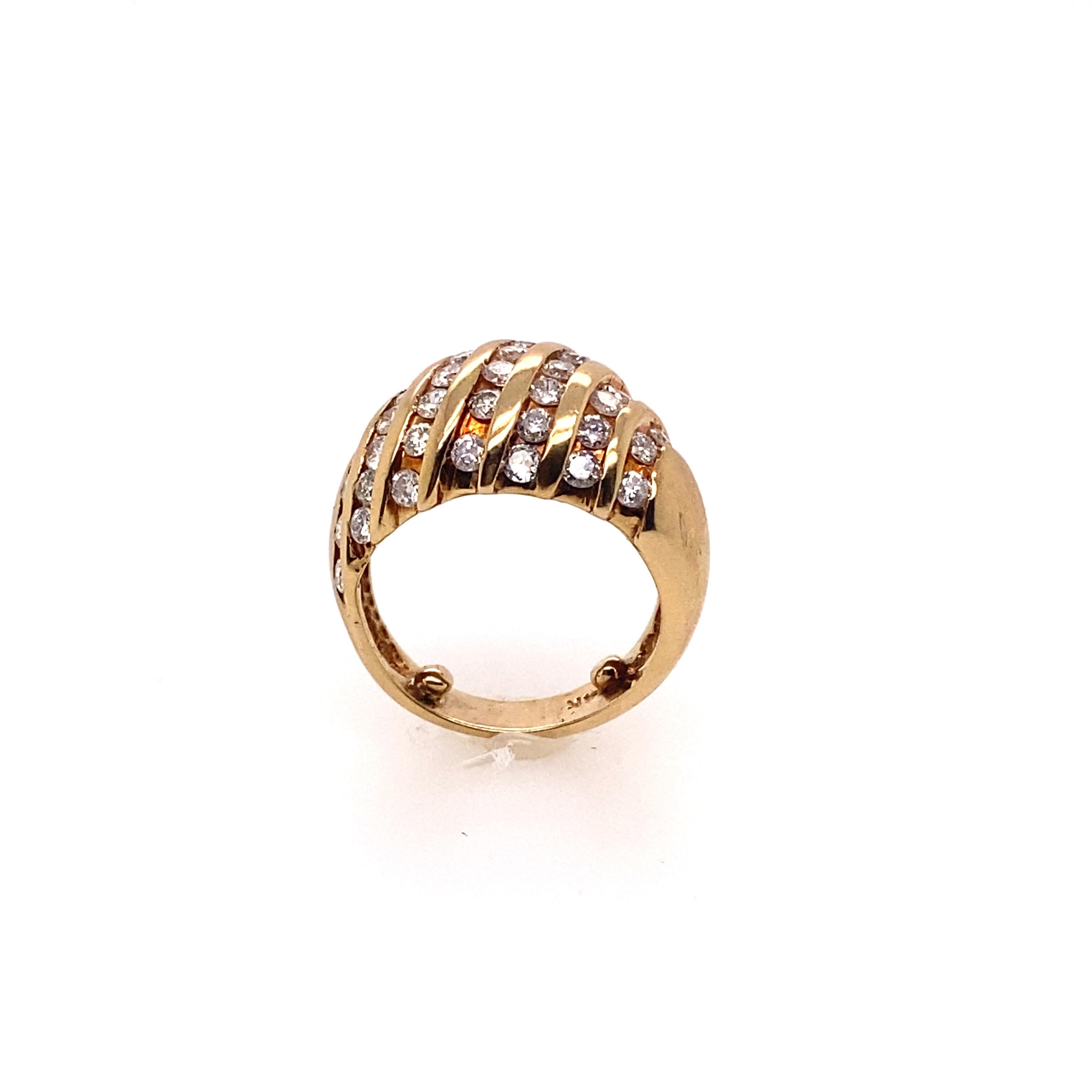 14 Karat yellow gold dome ring set with 47 diamonds totaling about 1.50 carats of round diamonds. Dome rings have a natural air of sophisticated vintage playfulness. Wear this chic accessory every day.

Diamonds Weight: 1.50 carat
Diamonds Shape :