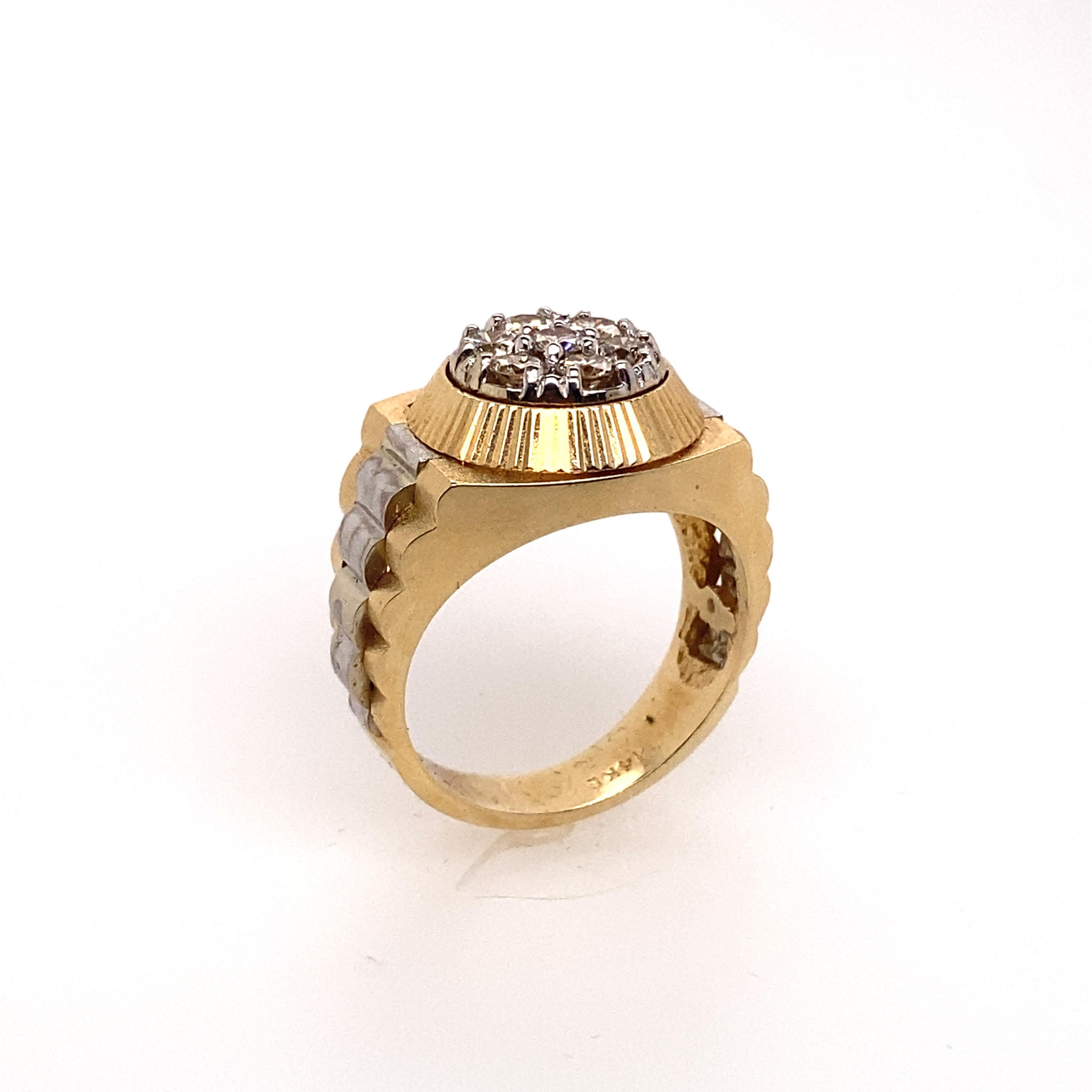 This stunning unisex signet ring is crafted in 14 karat yellow and white gold. The center is set with 7 brilliant round diamonds in that square modified halo style signet ring.

Diamonds Weight: 1.00 carat
Diamonds Shape : Brilliant Round
Diamonds