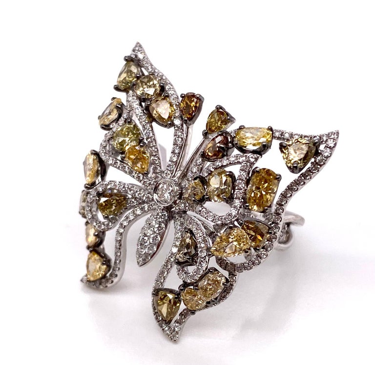 We are proud to say this is our first-ever butterfly ring. It's extremely cute. Our Butterfly Ring is a great everyday accessory that can be worn with any outfit.

Fancy Diamonds Shape: Pear, Oval, Heart
Fancy Diamonds Weight: 3.80 carat
Fancy