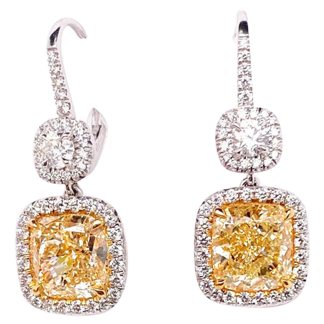 Ethonica GIA Certified 8.06 Carat Fancy Yellow Cushion Diamond Dangle Earrings For Sale