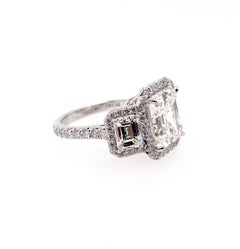 Ethonica GIA Certified Asscher Cut Diamond in Three-Stone Platinum Ring
