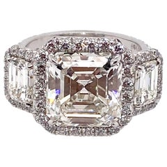 Ethonica GIA Certified Asscher Cut Diamond in Three-Stone Platinum Ring