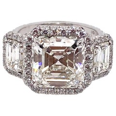 Anello in platino a tre pietre con diamante taglio Asscher certificato GIA Ethonica