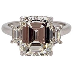 Ethonica GIA Certified Emerald Cut Diamond Three-Stone Ring in Platinum