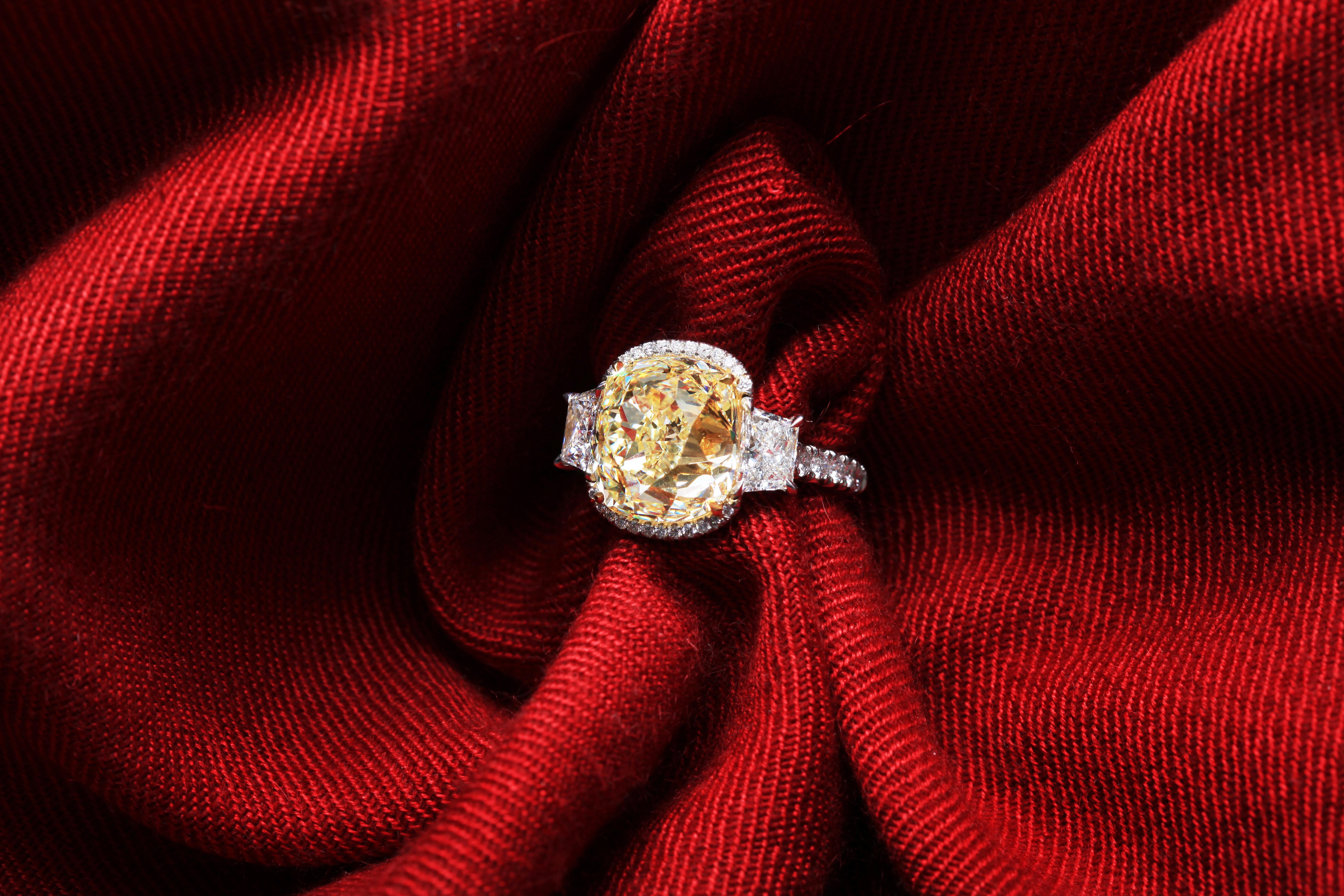 Contemporary Ethonica GIA Certified Old Cut Fancy Yellow Cushion Diamond Ring in Platinum