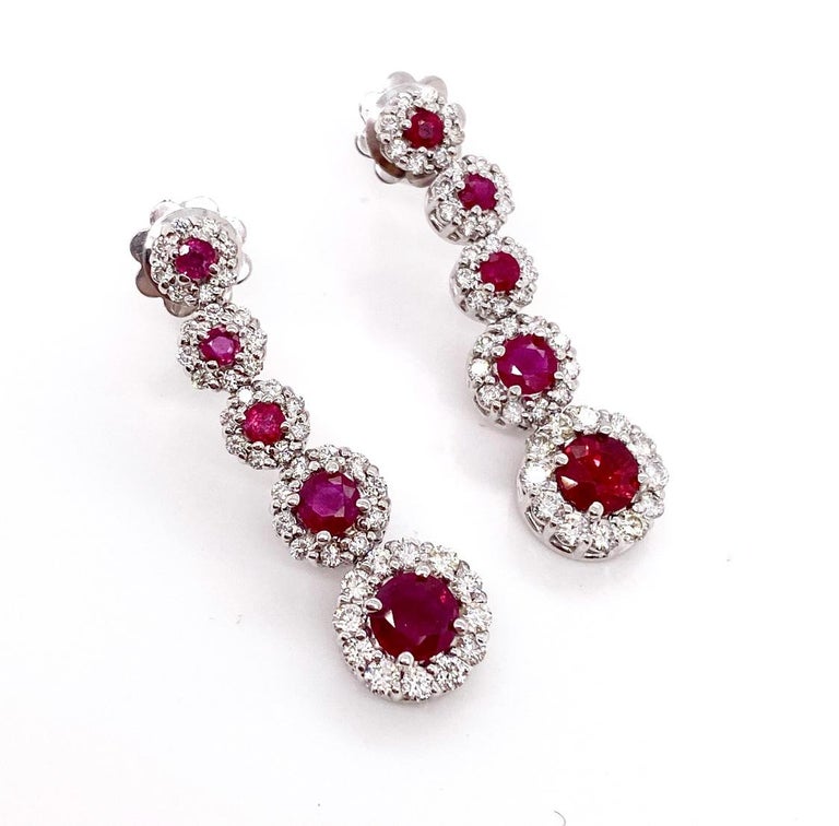 Contemporary Ethonica Halo Collection Ruby and Diamond Cluster Earrings in 18 Karat Gold For Sale