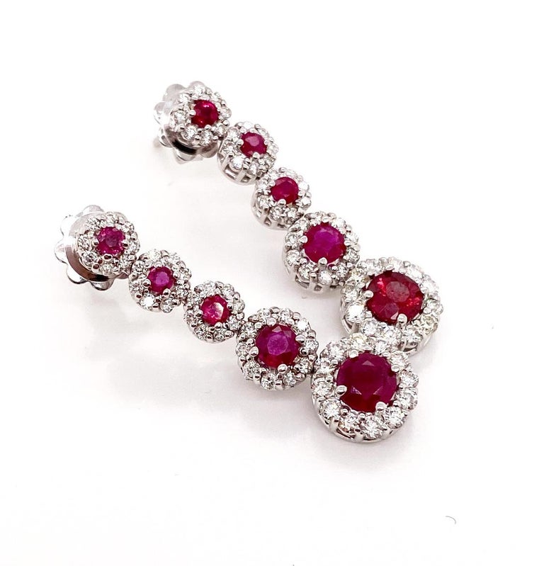 Round Cut Ethonica Halo Collection Ruby and Diamond Cluster Earrings in 18 Karat Gold For Sale