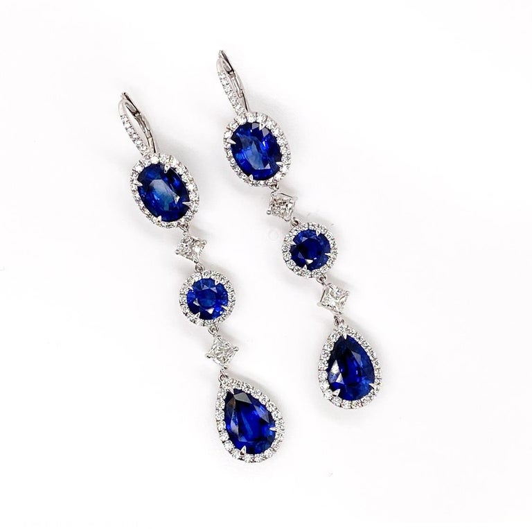 Oval Cut Ethonica Royal Blue Sapphire and Diamond Dangle Earrings in 18 Karat Gold For Sale