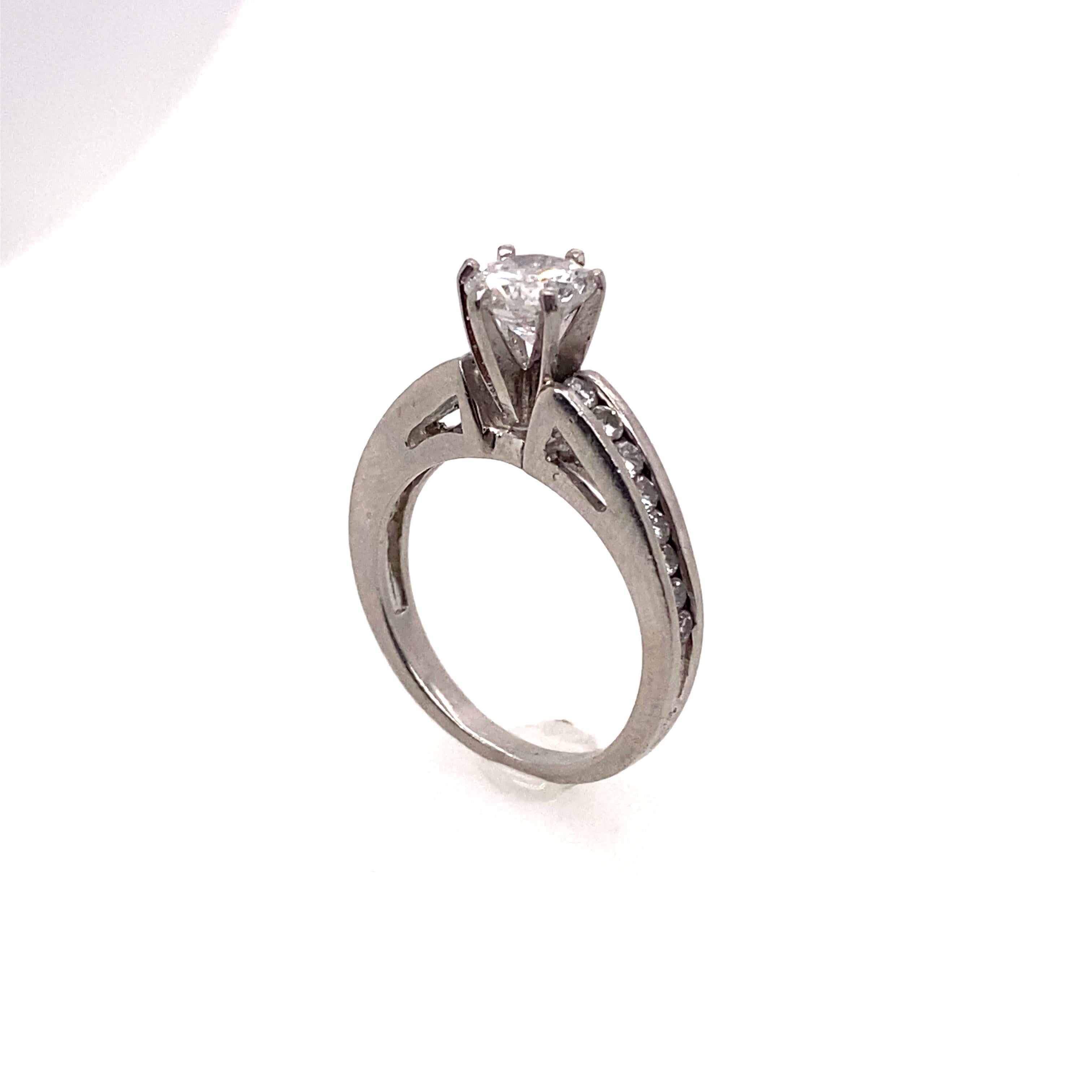 The brilliant round cut diamond 0.80 carat is set as a center stone in the platinum ring. The shank of the ring is also set with fourteen side diamonds. This ring is perfect for the solitaire diamond ring lovers.
 
Center Diamond Weight: 0.80