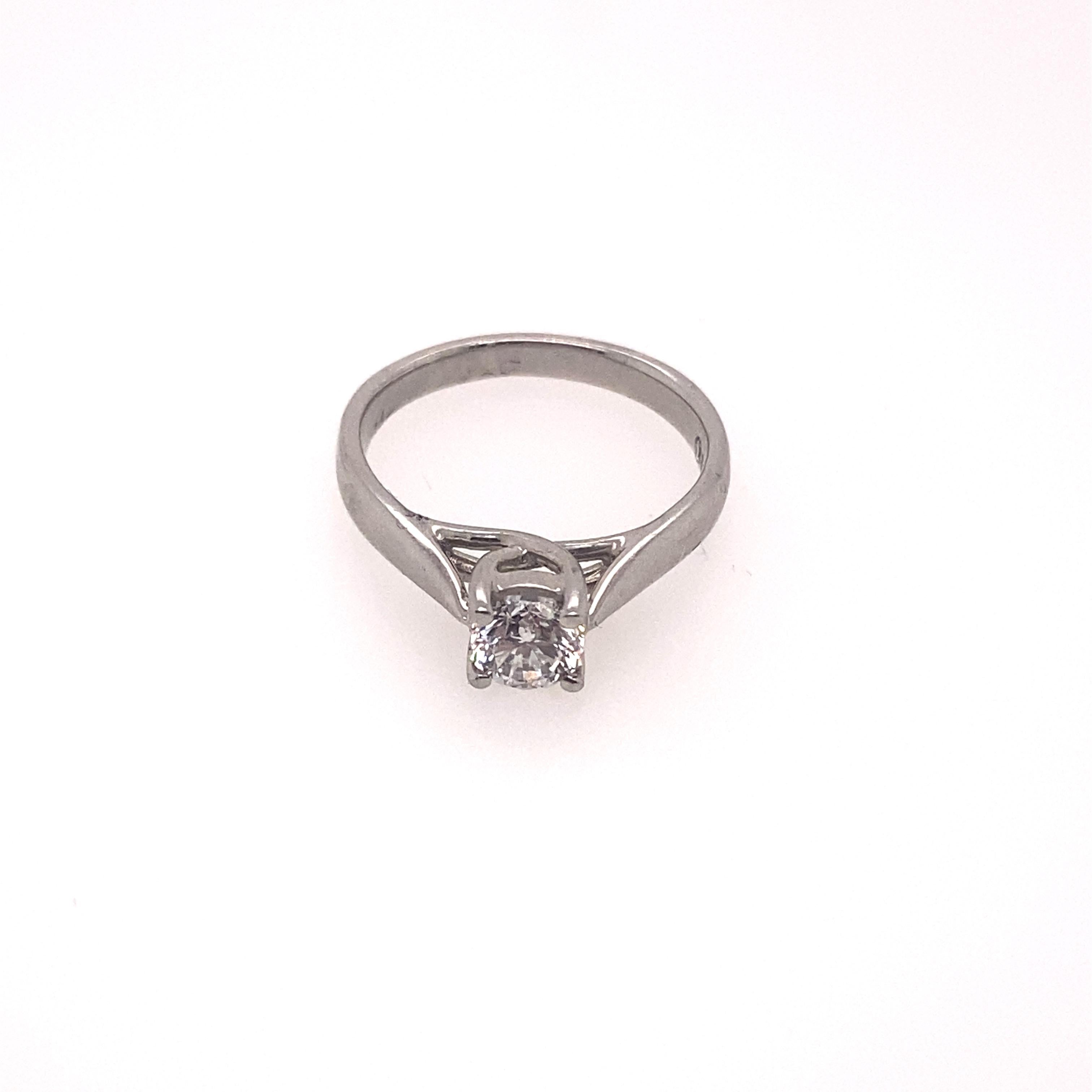 Round Cut Ethonica Solitaire Diamond Ring in Platinum For Sale