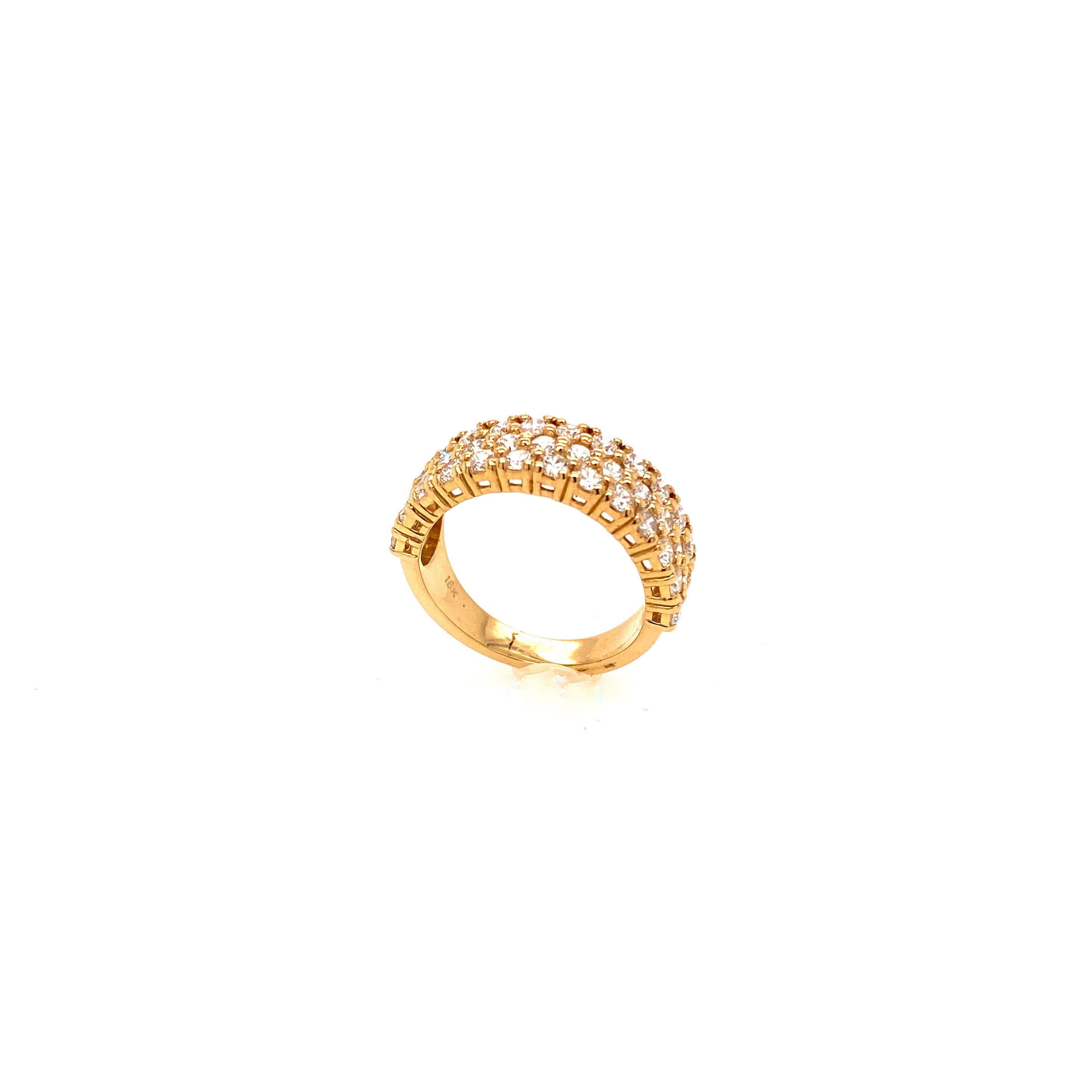 18K yellow gold triple row band ring containing thirty-eight round brilliant cut diamonds weighing 1.85 carats. Simple and classy. Very comfortable to wear in everyday. 

Diamond Shape: Brilliant Round
Diamond Color & Clarity: F-G, VS-SI

Diamond