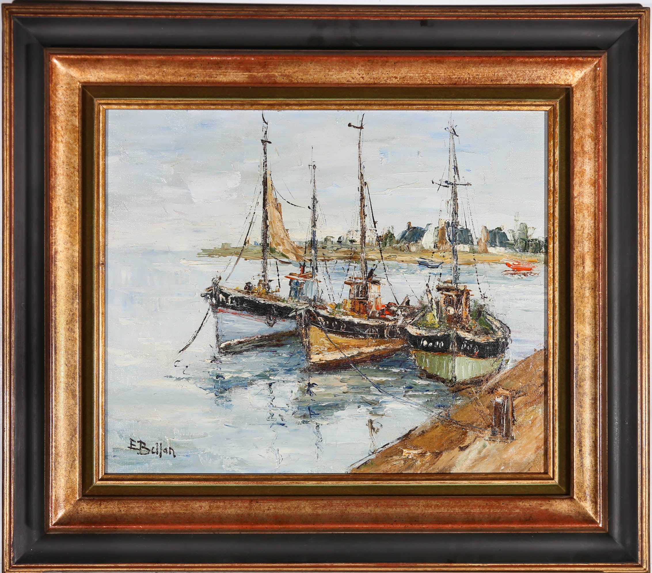 An expressive, impasto seascape by French artist Etienne Bellan (1922-2000) depicting colourful fishing boats moored in a quayside. The painting is signed to the lower left-hand corner. Well presented in a velvet slip and striking black and gilt