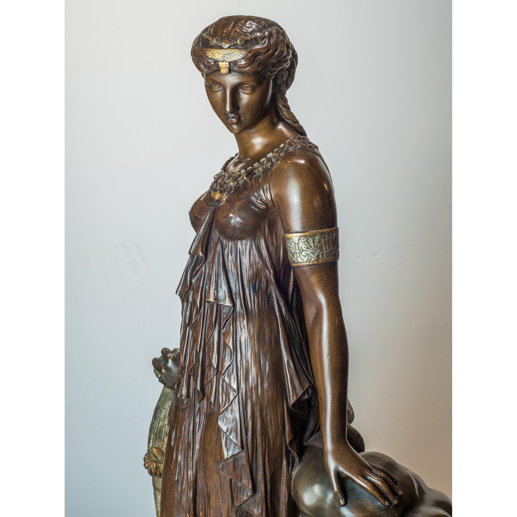 ÉTIENNE HENRY DUMAIGE
French, 1830-1888

Egyptian Princess
Signed 'H. DUMAIGE' on the cloak.
23 1/2 x 13 1/2 x 9 inches


A Fine Patinated Bronze Group Depicting an Egyptian Princess 
An Egyptian princess adorned with jewelry and wearing diaphanous