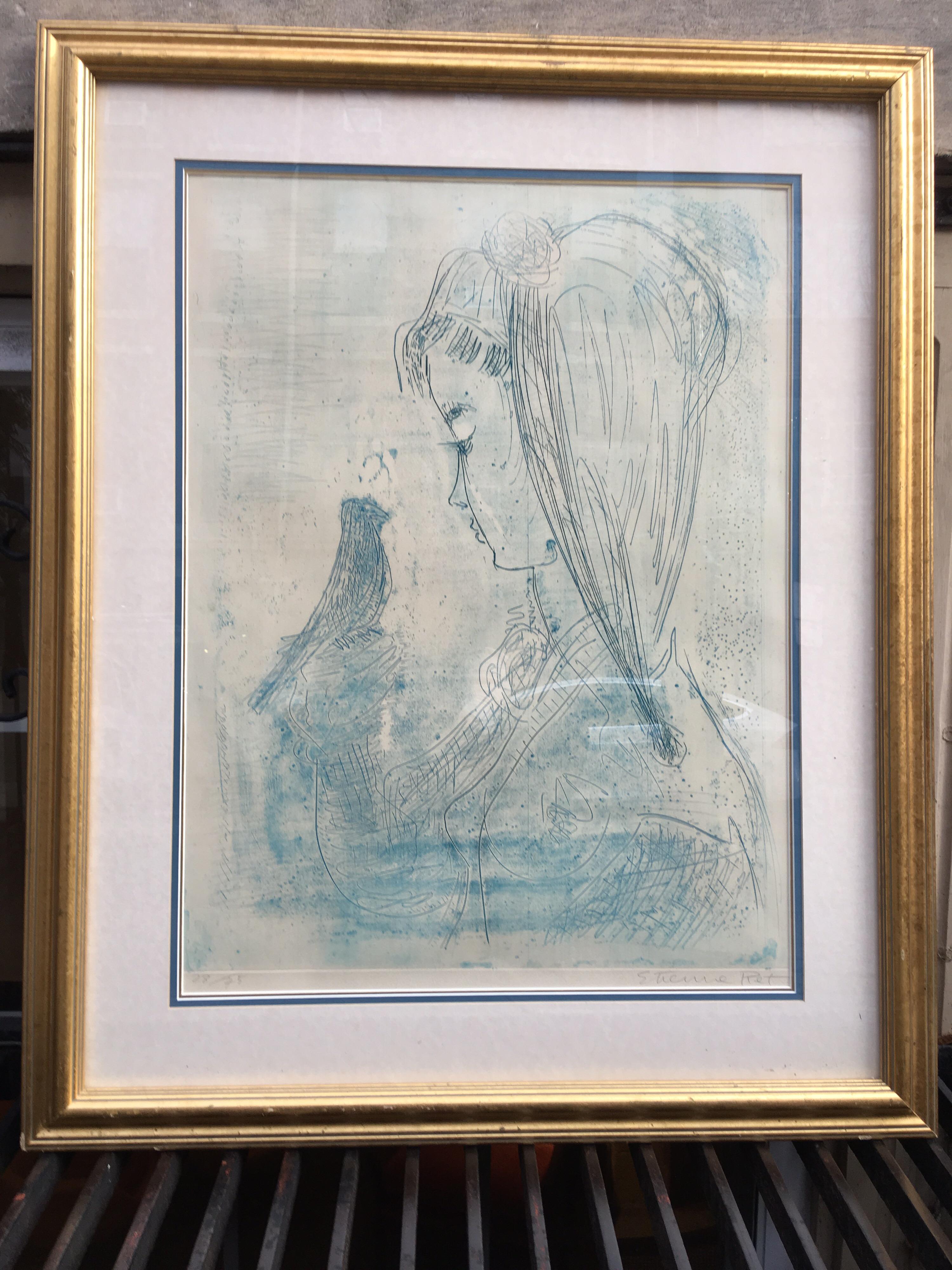 Etienne Ret signed and numbered lithograph of a girl with bird. Shades of blue, matted with a cream board and gold frame.