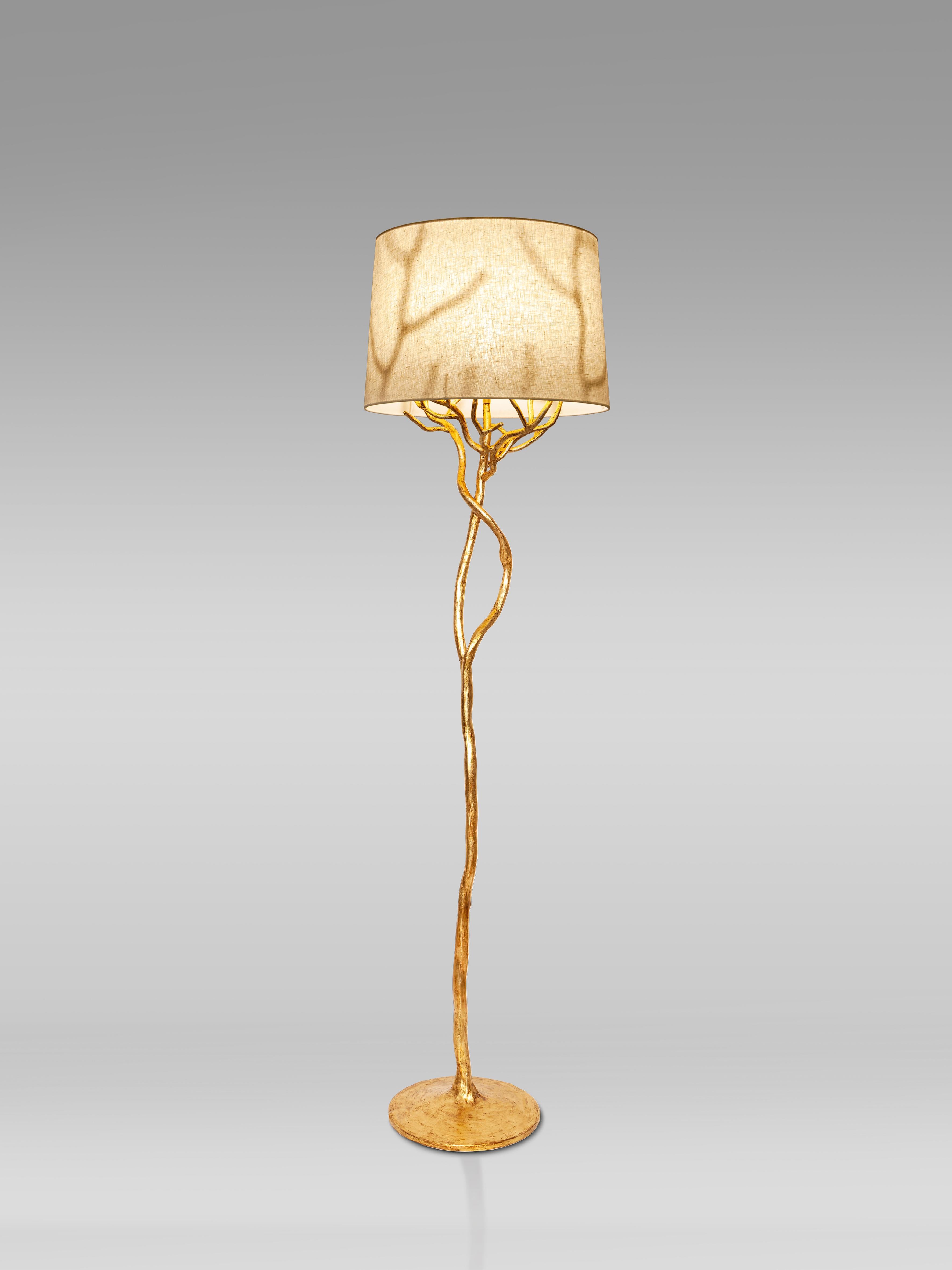 The Etna tree branch floor lamp is individually hammered and hand formed. Each piece has been hand-shaped with plaster to resemble the texture of tree bark and finished in Antique Gold. Available in Antique Gold and Bronze Plaster Finish. Inspired