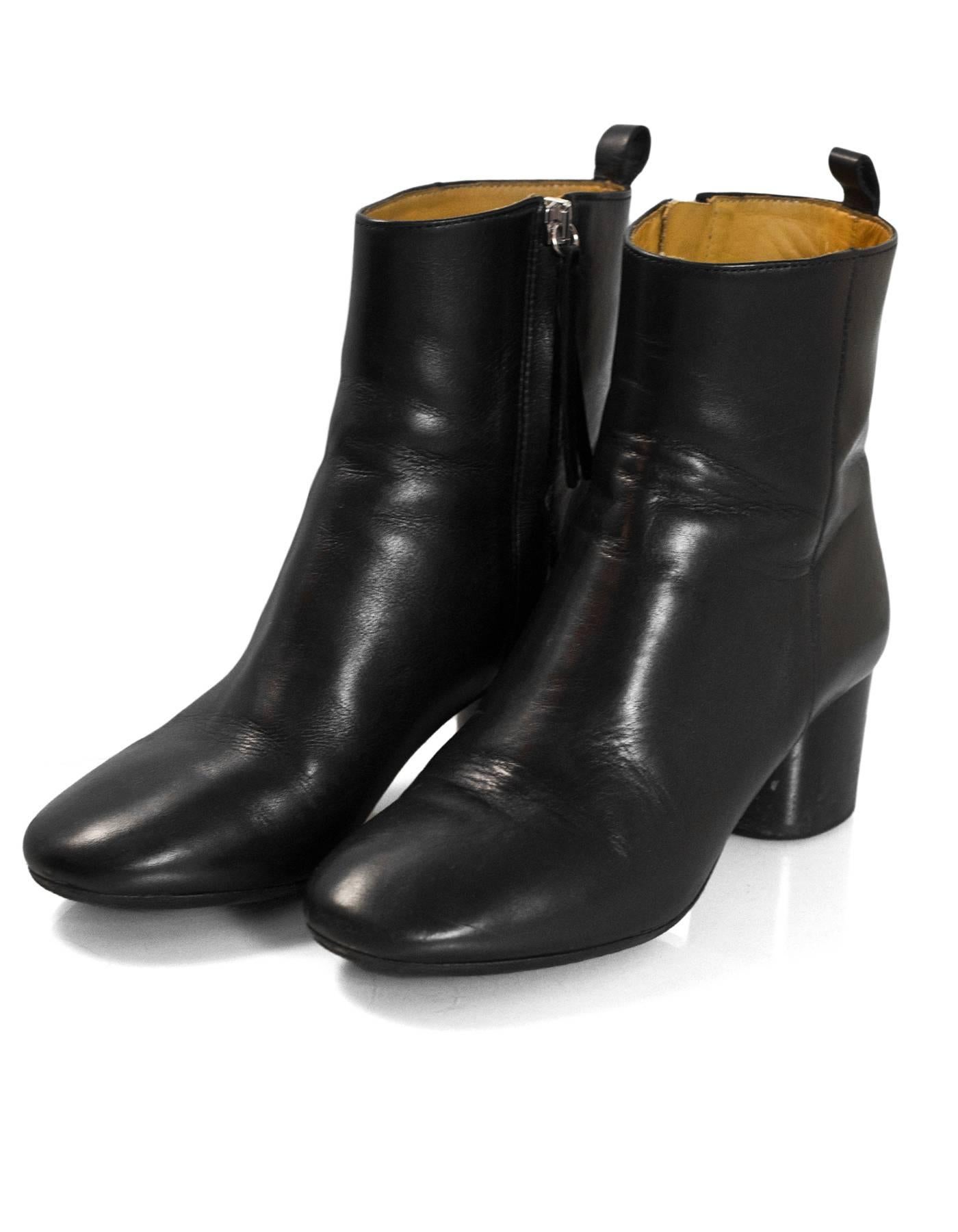 Etoile Isabel Marant Black Leather Deyissa Ankle Boots Sz 36

Made In: Portugal
Color: Black
Materials: Leather
Closure/Opening: Side zip closure
Sole Stamp: Isabel Marant Etoile Made in Portugal 36
Retail Price: $580+ tax
Overall Condition: