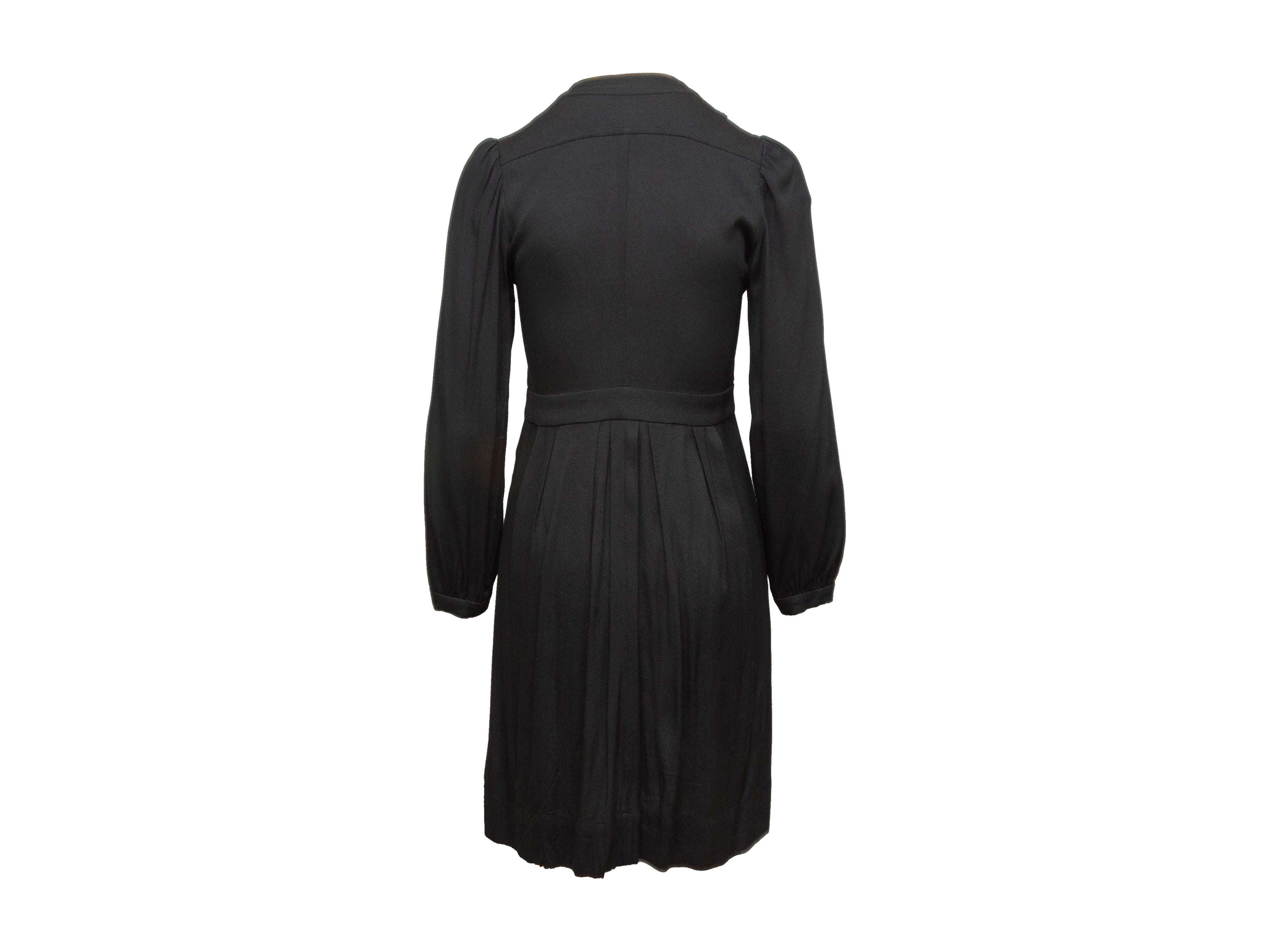 Product details: Black long sleeve pleated dress by Etoile Isabel Marant. V-neck. Button closures at bust. Designer size 36. 26