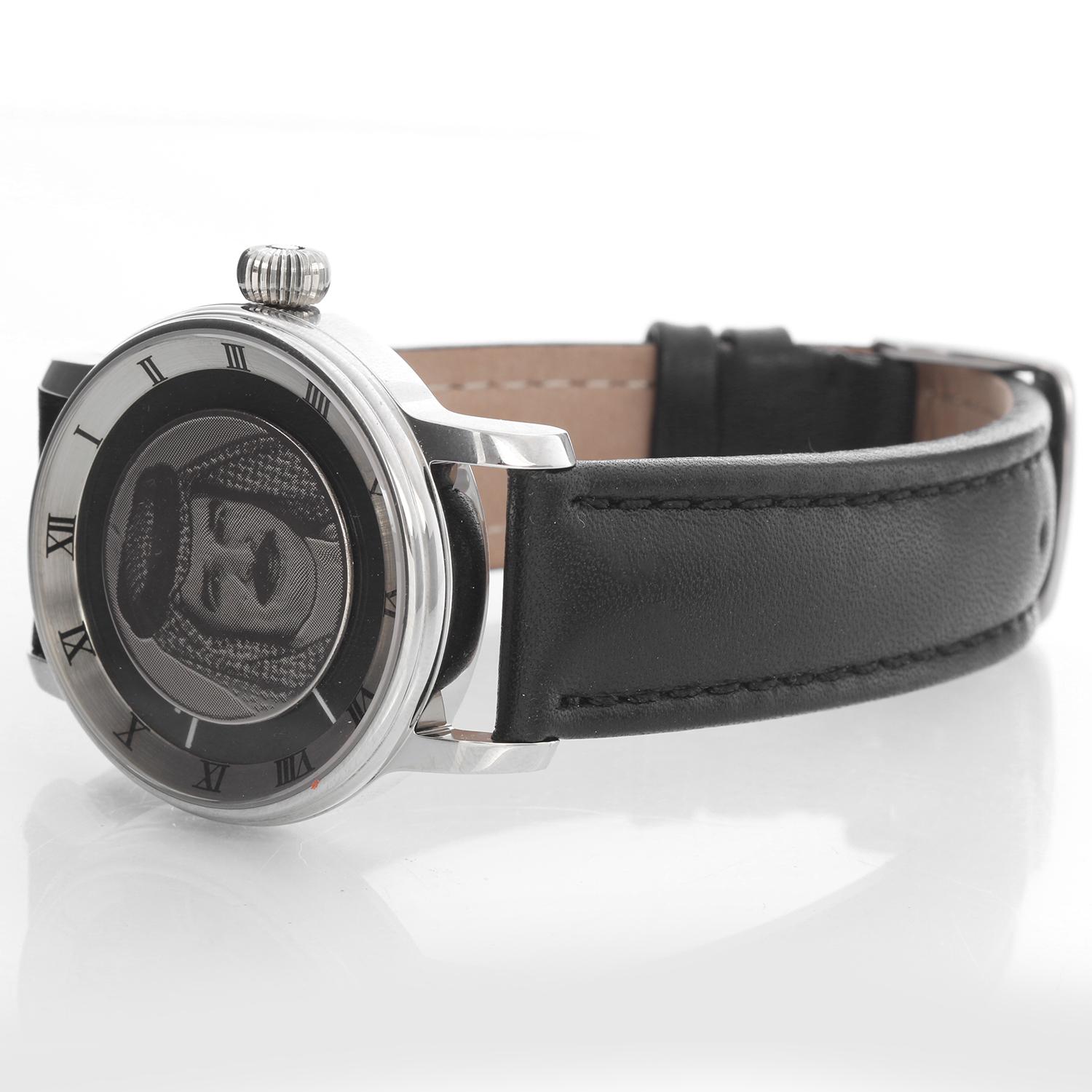 Etoile Stainless Steel  King of Bahrain Men's Watch - Automatic. Stainless Steel ( 38 mm ). King of Bahrain; Hamad bin Isa Al Khalifa with Roman numerals. Black leather strap with tang buckle. Pre-owned with Etoile box. This was given as a present