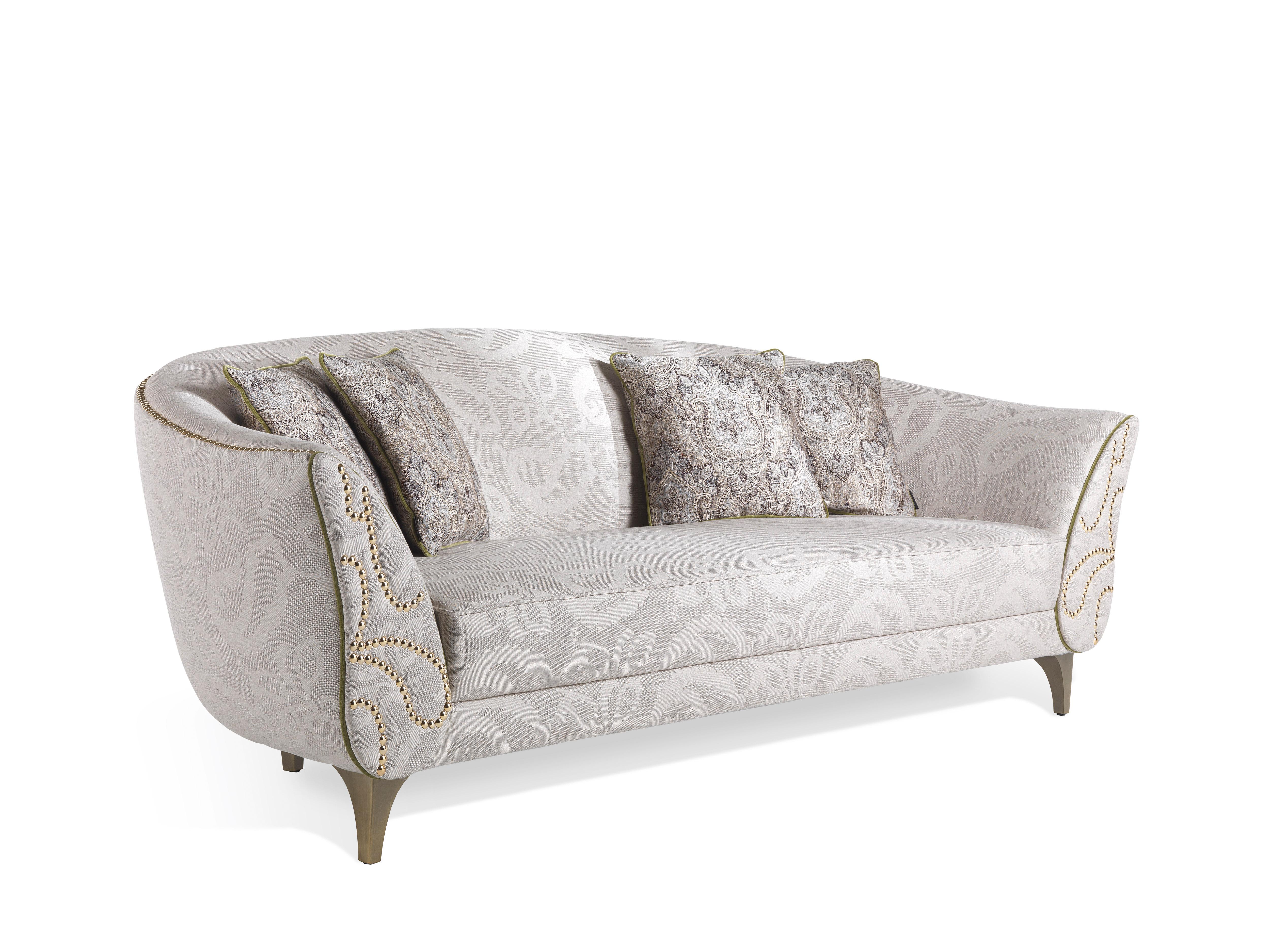 Classic charm meets oriental and spiritual suggestions in a refined and elegant sofa. The references to the Asiatic, mystical culture are declined in the use of gold and light tone sur tone nuances, revealing the introspective character of the
