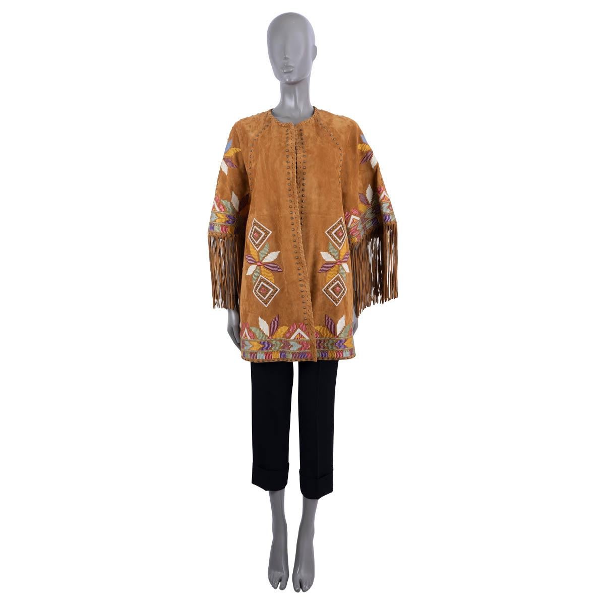 100% authentic Etro fringed jacket in amber goat skin suede. Features multicolored geometric  embroidery, an open front, short raglan sleeves and studded details along the hem, front and back. Lined in floral printed cotton (100%). Medium Weight.Has