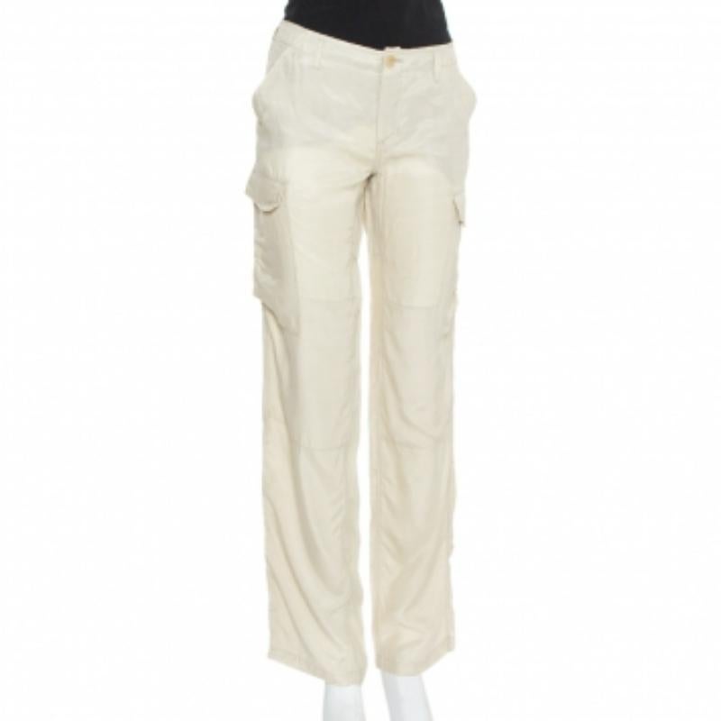 Elevate your casual style with these cargo trousers from Etro. The beige trousers are cut from cupro and carry a smart design with front fastening and multiple pockets. The lightweight creation is well-made and comfortable to wear.