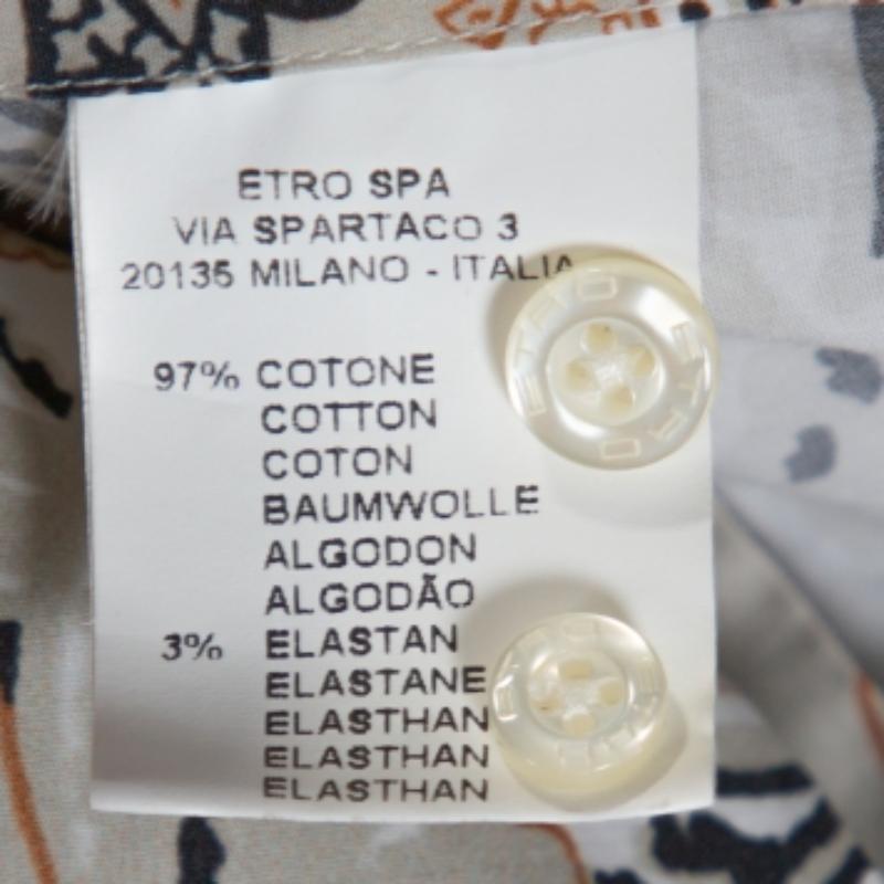 Magníficamente confeccionada en una mezcla de algodón, esta camisa Etro beige está diseñada con estampado paisley, botones delanteros, manga larga y cuello sencillo. Esta cómoda creación añadirá sin duda un toque lujoso a tu vestuario.