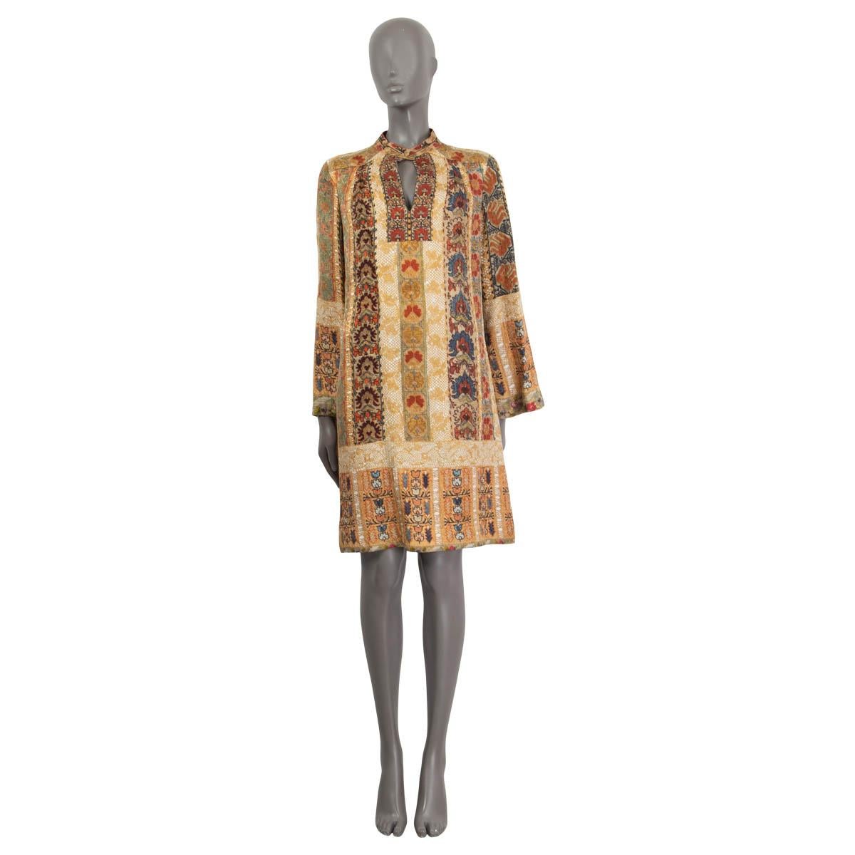 100% authentic Etro long sleeve dress in beige, green, burgundy and blue silk (38%), viscose (35%) and wool (27%). Embellished with floral stripe prints and a round split neck. Opens with a button on the neck. Unlined. Has been worn and is in