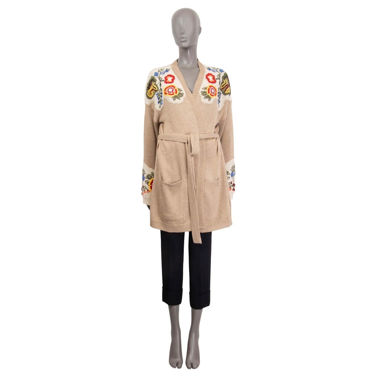 100% authentic Etro belted knit cardigan in beige, yellow, blue, green, red and off-white silk (46%), linen (37%) and cotton (17%). Features a floral print on the shoulders and the cuffs. Has two patch pockets on the front. Unlined. Brand new with
