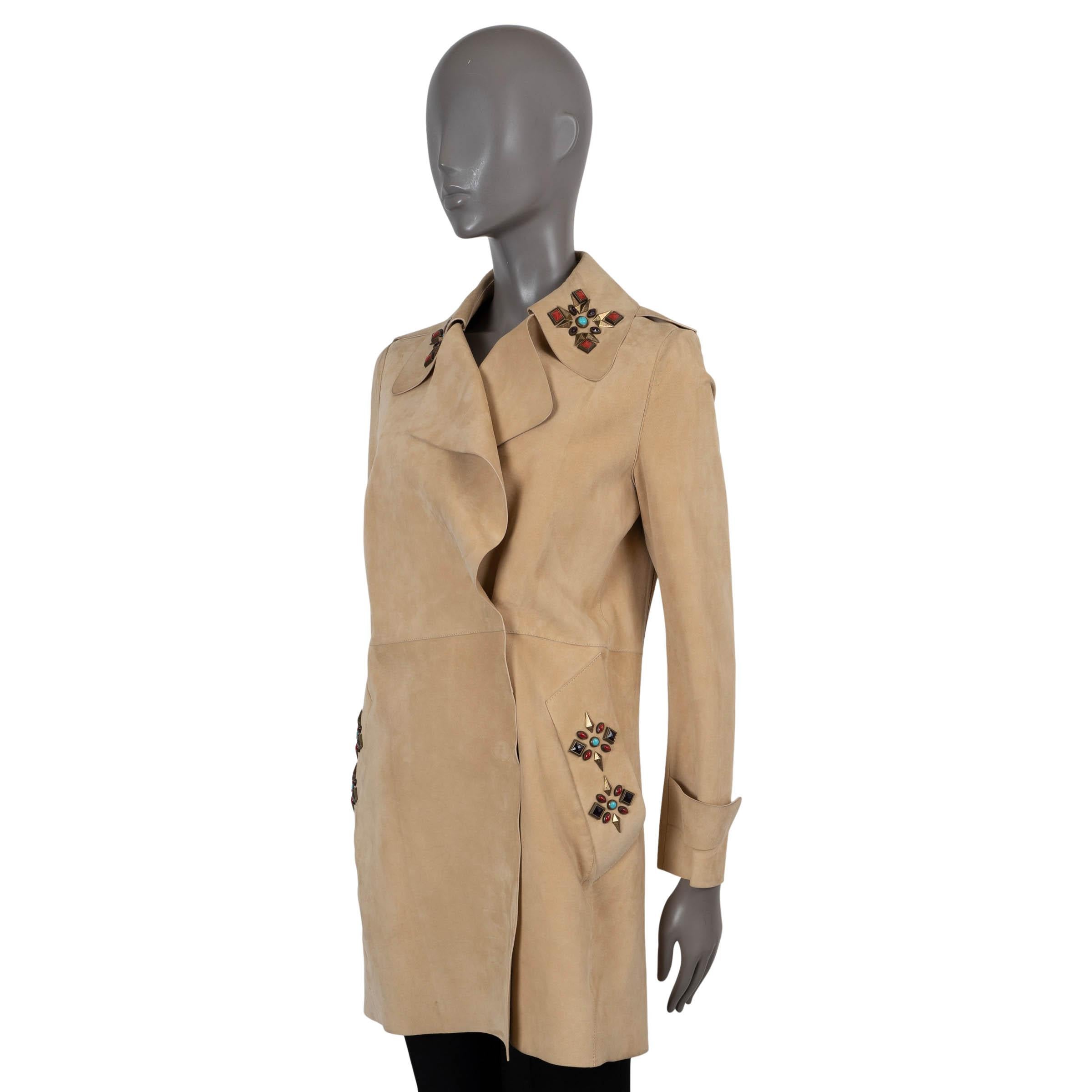 100% authentic Etro embellished coat in beige suede leather. Features two slit pockets on the front and decorated with stones on the collar and pockets. Opens with four hidden push buttons on the front. Unlined. Black stains on the right shoulder