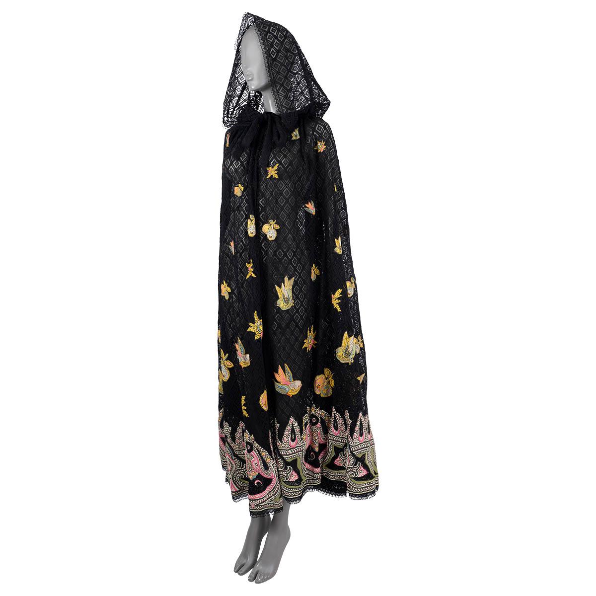 100% authentic Etro hooded lace cape in black cotton (62%), viscose (30%) and polyamide (8%). The design features a hood with tie laces, lace detailing and appliqué details that are decorated by apples, birds and an intarsia paisley border in