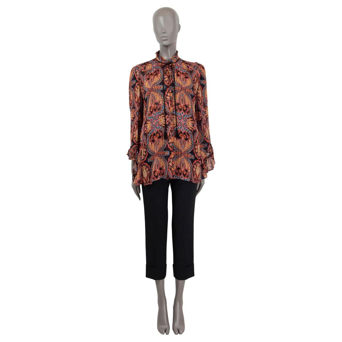 100% authentic Etro paisley printed blouse in black, red, orange, yellow and blue viscose (59%) and cotton (41%). Features rouched bell sleeves and a black tassel tie around the neck. Unlined. Has been worn and is in excellent condition.