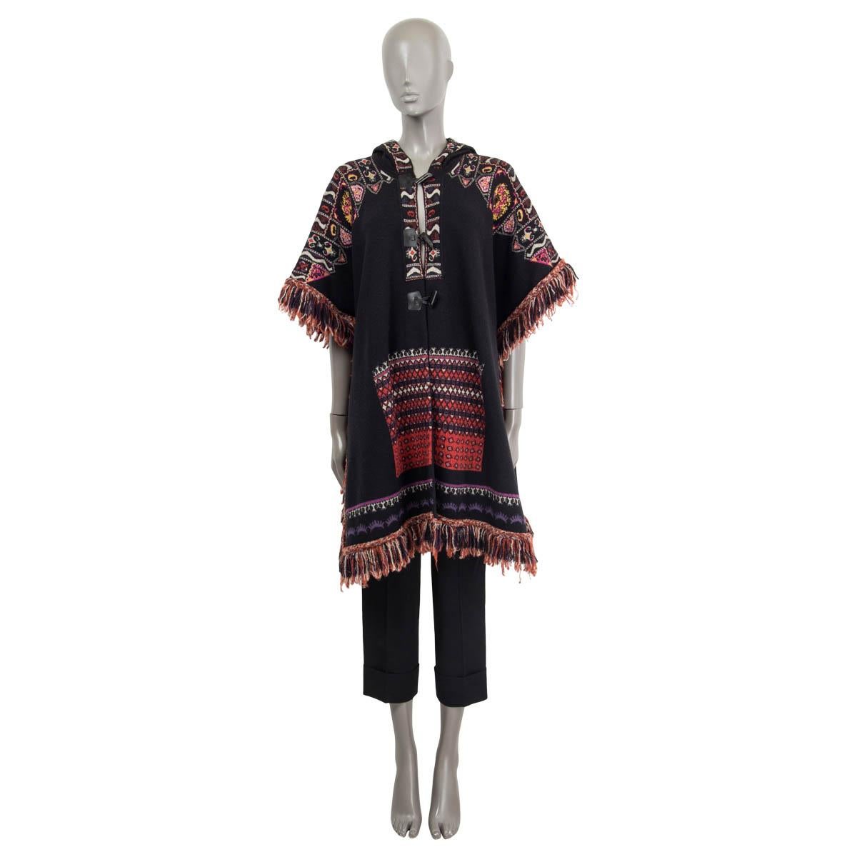100% authentic Etro hooded knit cape in black , burgundy, brick, purple and pink wool (90%), viscose (3%), silk (2%), acrylic (2%), polyamide (2%) and polyester (1%) (Please note the content & brand tag are missing). Features fringed trims and