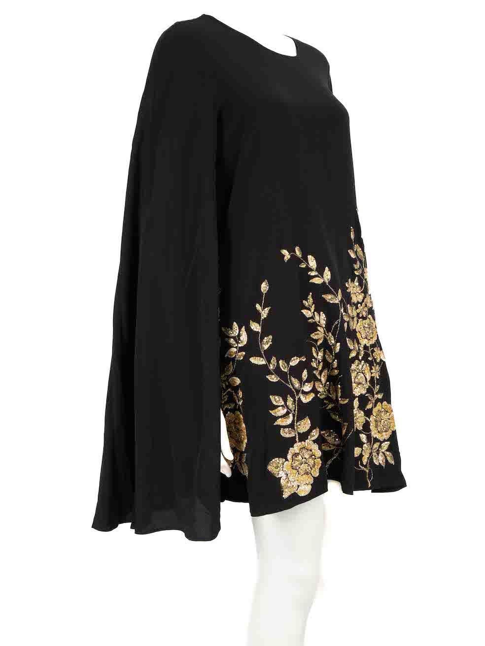 CONDITION is Very good. Minimal wear to dress is evident. Minimal wear to both underarm linings with light marks on this used Etro designer resale item.
 
 
 
 Details
 
 
 Black
 
 Silk
 
 Cape dress
 
 Mini
 
 Gold sequin embellishment
 
 Round