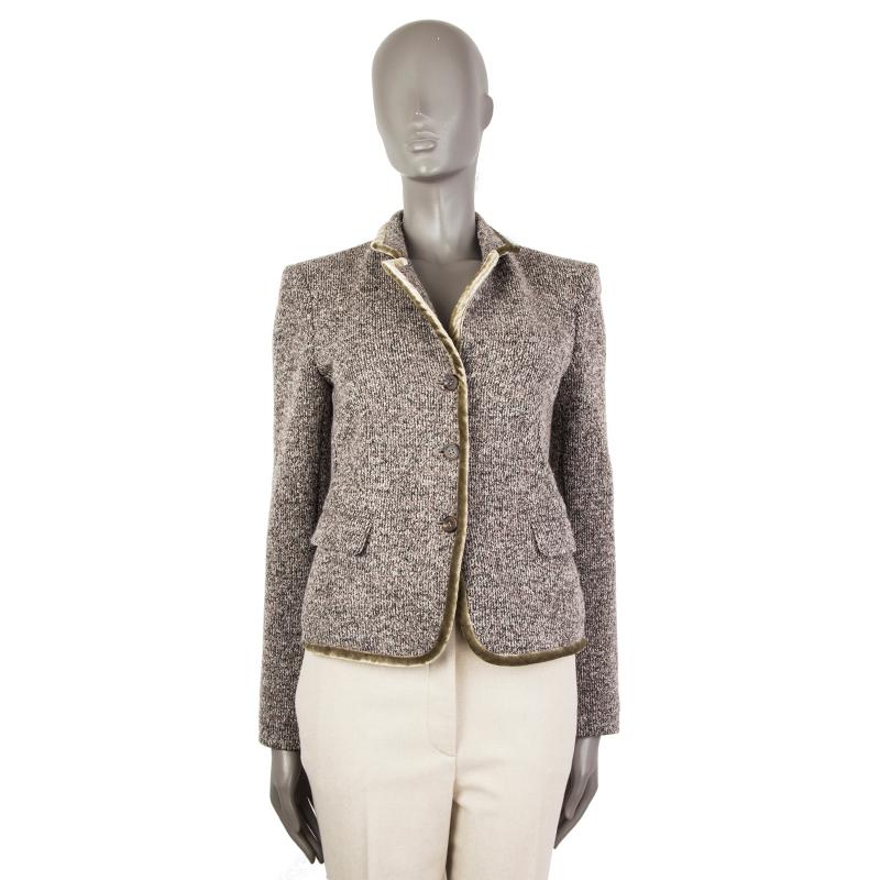 authentic Etro tweed blazer in black, grey, white wool (73%), nylon (14%), acetate (10%), and viscose (3%), With sage velvet trim. WIth two flap pockets on the front sides and buttoned cuffs. Sleeves lined in dark grey and beige polyester (51%) and