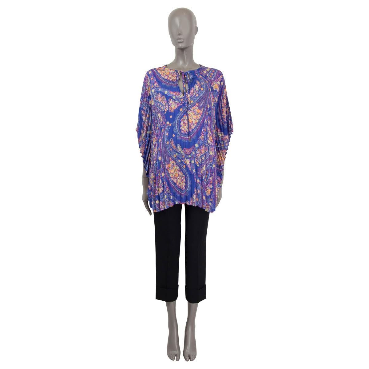 100% authentic Etro Rodin sharp plissé pleated flutter-sleeve top in blue, lilac, pink, yellow, sage and orange polyester (100%) with a large-scale paisley motif. V-neck with self-tie closure and three-quarter bell sleeves. Has been worn and is in