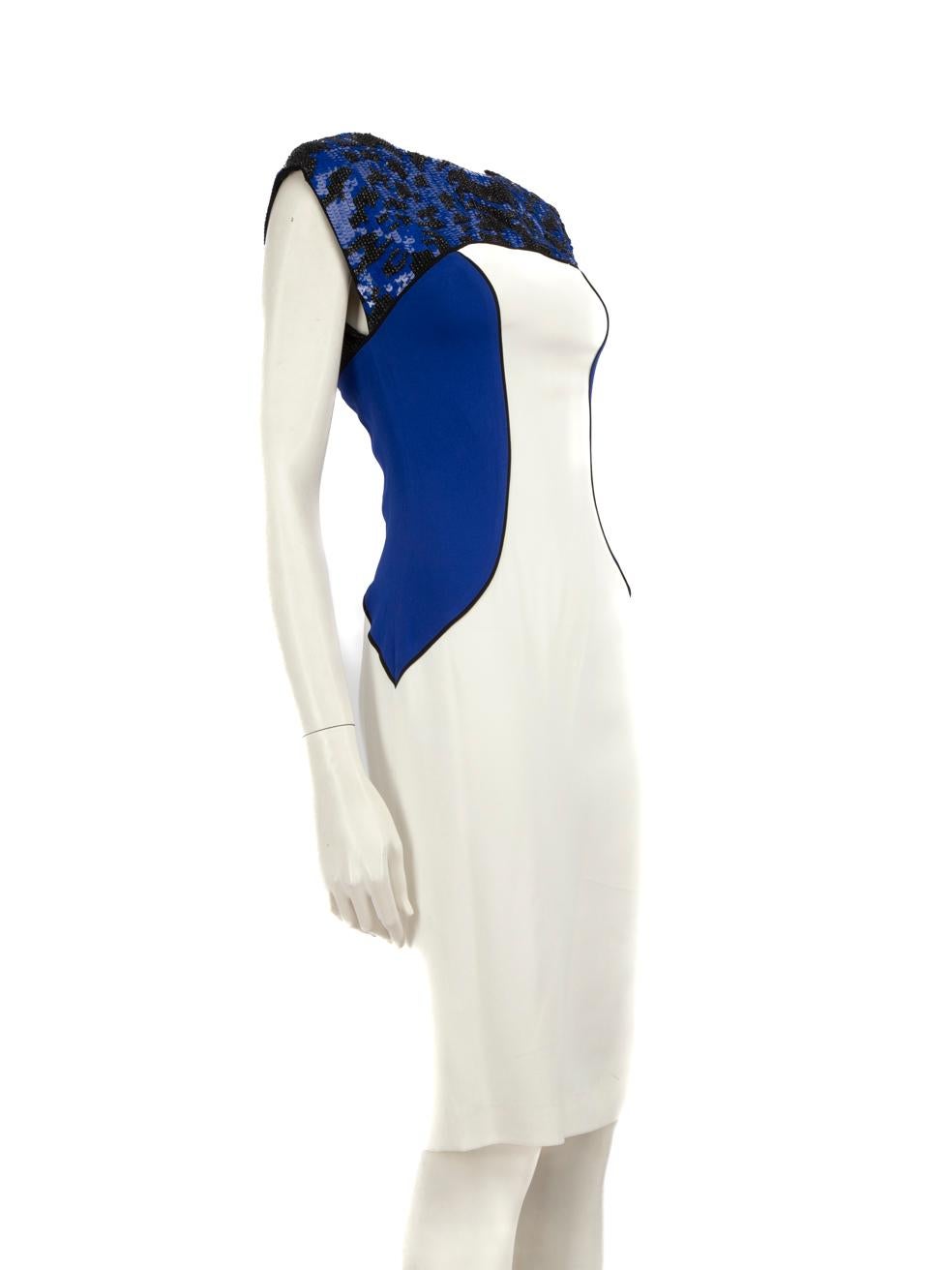 CONDITION is Very good. Minimal wear to dress is evident. There is a pull to the weave along the top left white panel and other light plucks to the weave along the dress material. The stitching has a weak spot at the base of the zip. There is loose