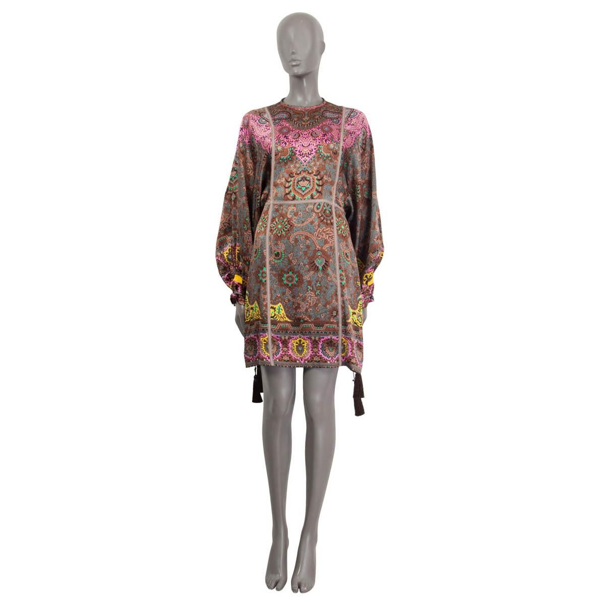 100% authentic Etro batwing long sleeve dress in mulitcolor paisley printed silk (100%). Embellished with two cords on the cuffs. Comes with an open back and opens with a button and a concealed zipper on the open back. Unlined. Has been worn and is