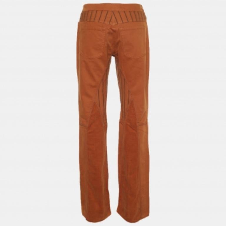 This pair of brown pants from Etro features striped panels. These uber-chic pants can be worn very comfortably all day long since they are made from cotton.