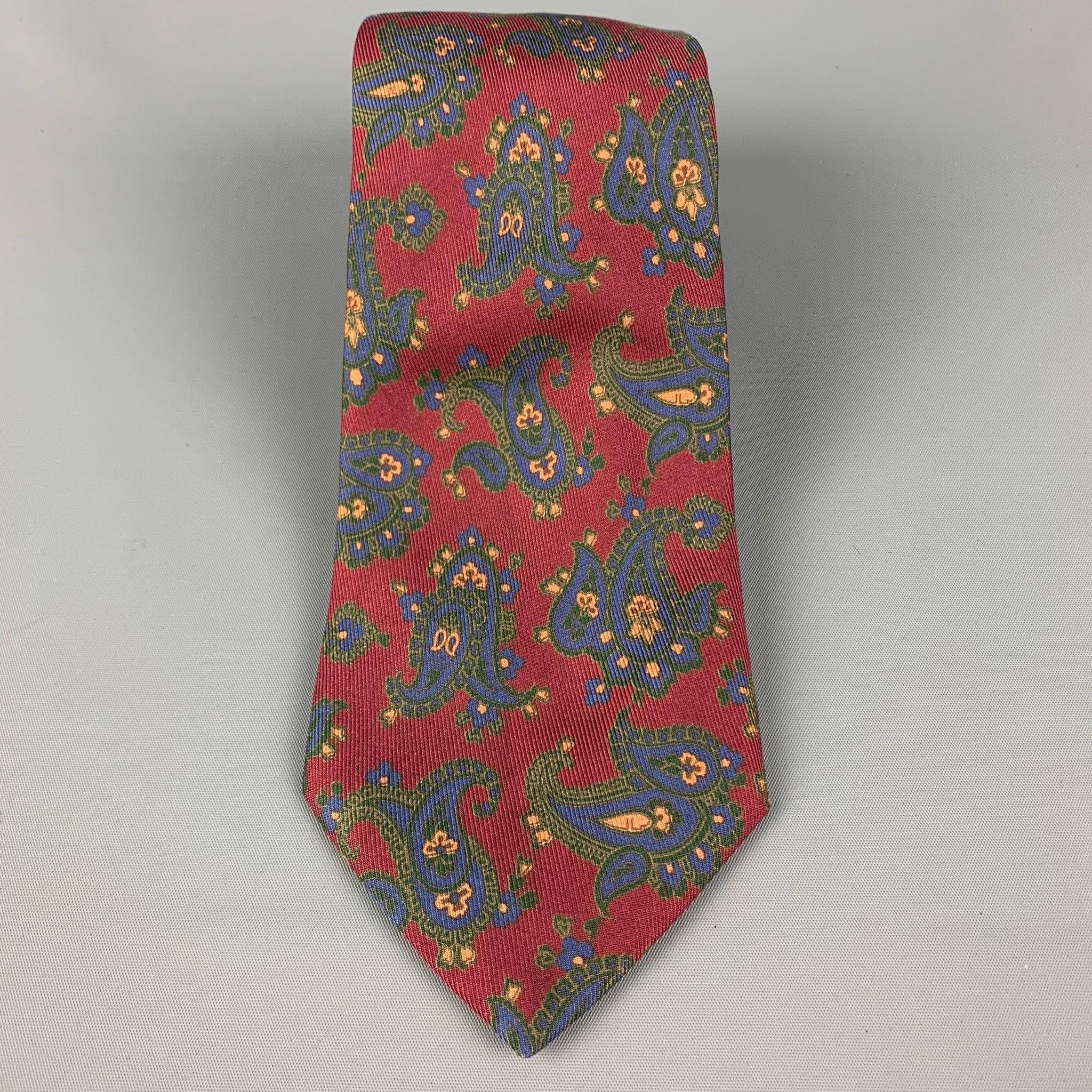 ETRO
necktie comes in a burgundy silk twill with a all over paisley print. Made in Italy. Good Pre-Owned Condition. 

Measurements: 
  Width: 4 inches  Length: 62 inches 
  
  
 
Reference: 45435
Category: Tie
More Details
    
Brand:  ETRO
Color: 