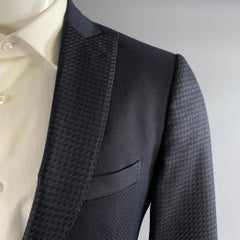 Veste de sport ETRO, tour de poitrine 42, noir et bleu marine, en jacquard de laine et soie, à revers en pointe