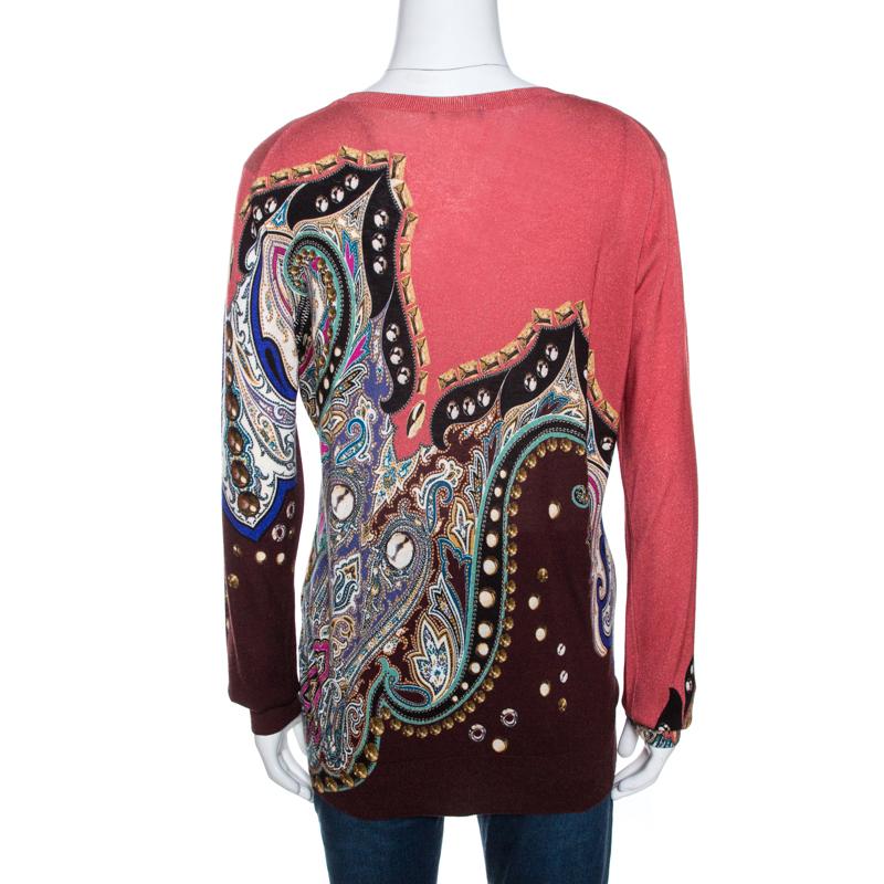 Exhibiting an elegant design, this Etro top is a closet staple. The smart use of pink in this top attracts attention and the paisley print gives it a signature touch. Made from a silk and cashmere blend, this top is an example of timeless couture