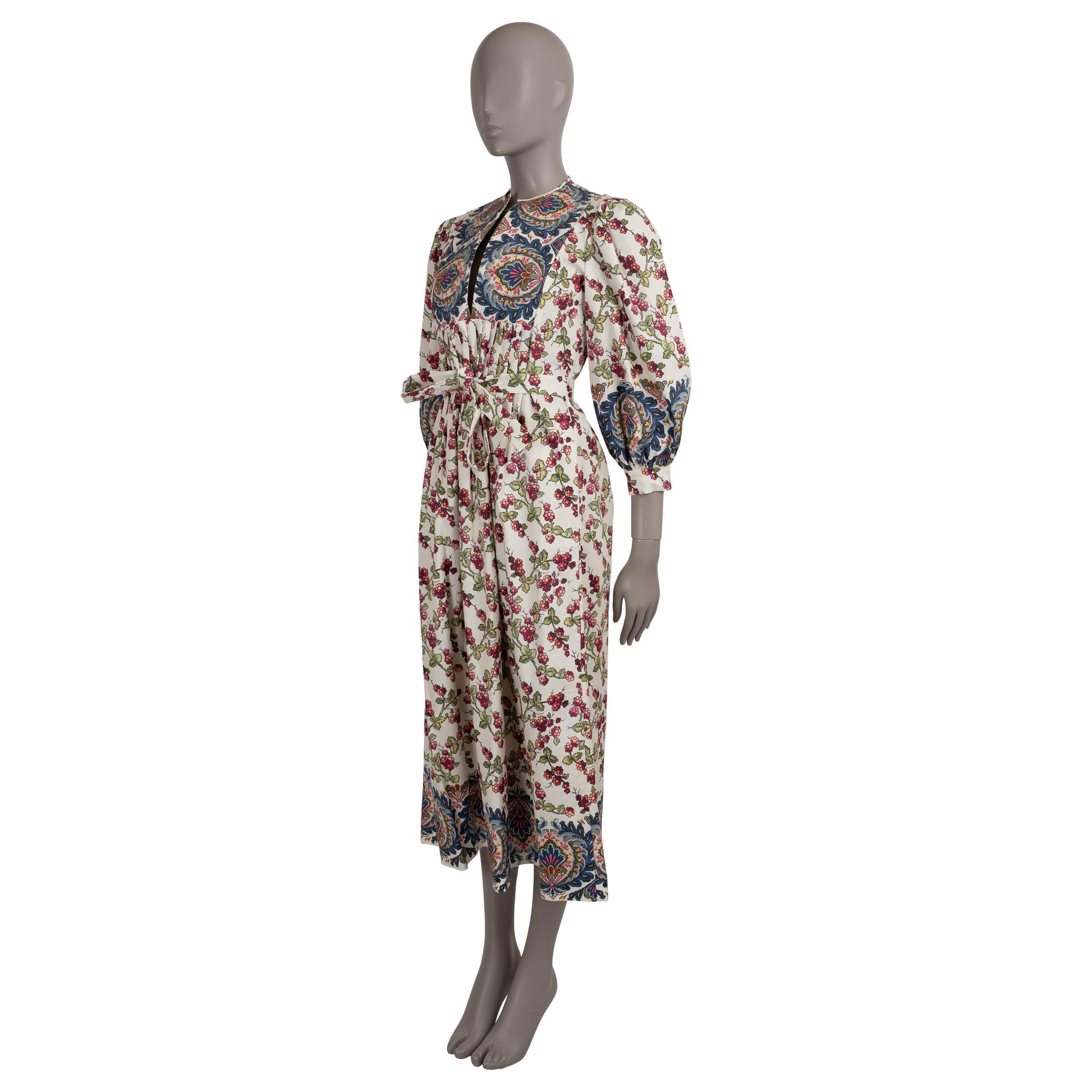 This 100% authentic Etro dress is crafted in creme poplin cotton with 3% elastane and adorned with a pink berry and navy blue paisley placement print. Designed in a relaxed midi-length silhouette, it features soft pleating from the bust down, a