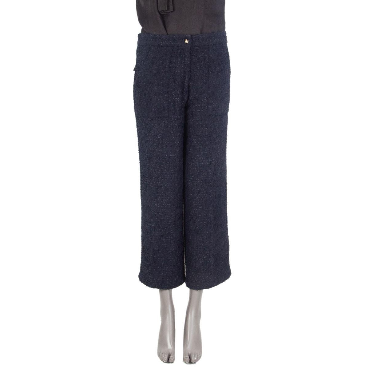 100% authentic Etro culotte pants in midnight blue bouclé in cotton (81%) and polyamide (19%) featuring signature gold-tone and dark blue Pegaso buttons. Two slit pockets at front and flap pockets at the back. Have been worn one and are in virtually