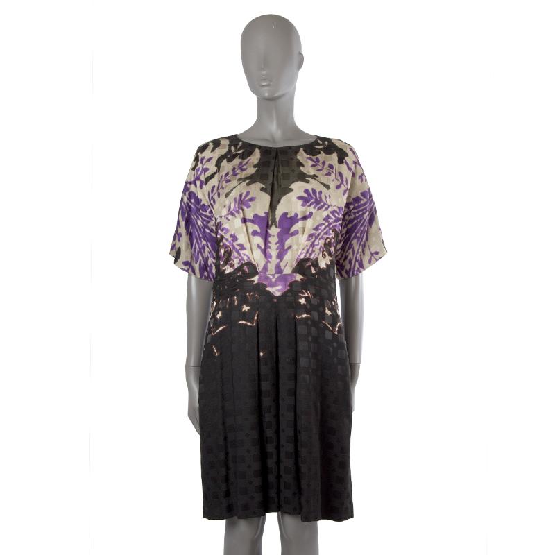 100% authentic Etro short-sleeve dress in dark forest green, violet, sand, black, and red silk (55%) and wool (45%). With pleats on the front and back of the top, as well as box pleats on the front and back of the skirt. Closes with invisible side